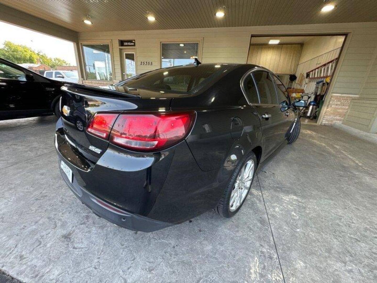 2014 Phantom Black Metallic Chevrolet SS (6G3F15RW5EL) with an 6.2L V8 415hp 415ft. lbs. engine, Automatic transmission, located at 25355 Eames Street, Channahon, IL, 60410, (815) 467-1807, 41.429108, -88.228432 - Looking for a high-performance sports sedan that'll have your heart racing with every drive? Look no further than this 2014 Chevrolet SS! Powered by a 6.2L V8 engine that cranks out a heart-pumping 415 horsepower and 415 foot-pounds of torque, this vehicle is a true beast on the road. But the powe - Photo#3