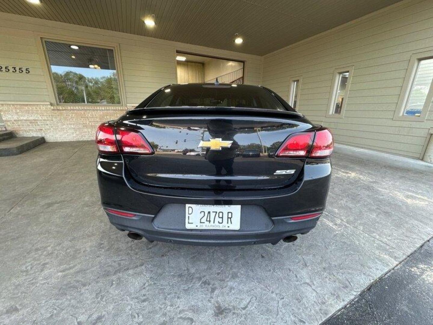 2014 Phantom Black Metallic Chevrolet SS (6G3F15RW5EL) with an 6.2L V8 415hp 415ft. lbs. engine, Automatic transmission, located at 25355 Eames Street, Channahon, IL, 60410, (815) 467-1807, 41.429108, -88.228432 - Looking for a high-performance sports sedan that'll have your heart racing with every drive? Look no further than this 2014 Chevrolet SS! Powered by a 6.2L V8 engine that cranks out a heart-pumping 415 horsepower and 415 foot-pounds of torque, this vehicle is a true beast on the road. But the powe - Photo#4