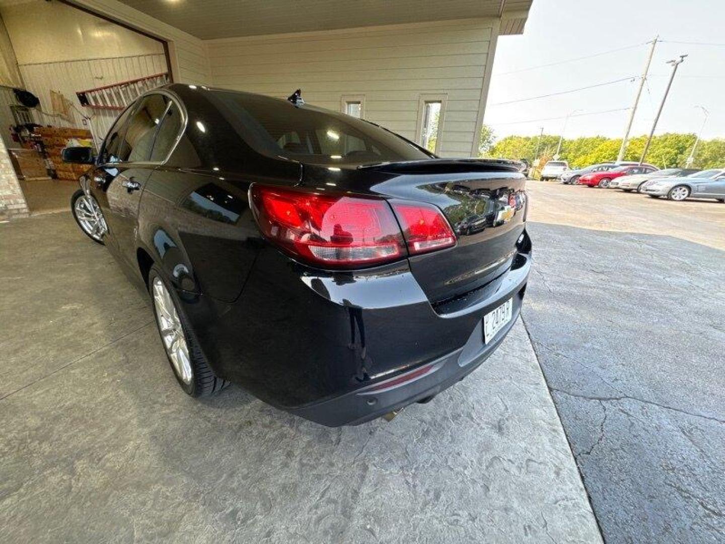 2014 Phantom Black Metallic Chevrolet SS (6G3F15RW5EL) with an 6.2L V8 415hp 415ft. lbs. engine, Automatic transmission, located at 25355 Eames Street, Channahon, IL, 60410, (815) 467-1807, 41.429108, -88.228432 - Looking for a high-performance sports sedan that'll have your heart racing with every drive? Look no further than this 2014 Chevrolet SS! Powered by a 6.2L V8 engine that cranks out a heart-pumping 415 horsepower and 415 foot-pounds of torque, this vehicle is a true beast on the road. But the powe - Photo#5