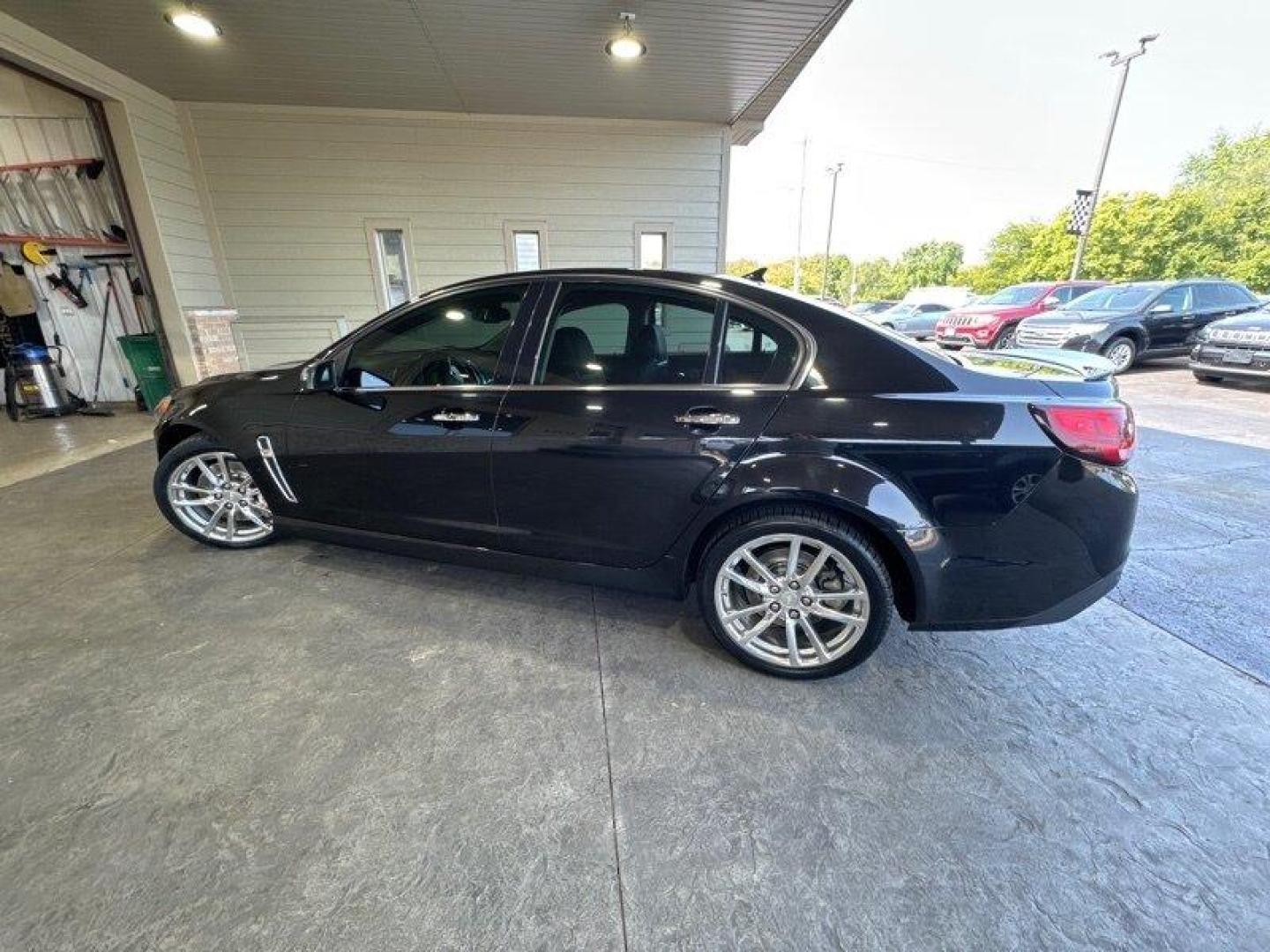 2014 Phantom Black Metallic Chevrolet SS (6G3F15RW5EL) with an 6.2L V8 415hp 415ft. lbs. engine, Automatic transmission, located at 25355 Eames Street, Channahon, IL, 60410, (815) 467-1807, 41.429108, -88.228432 - Looking for a high-performance sports sedan that'll have your heart racing with every drive? Look no further than this 2014 Chevrolet SS! Powered by a 6.2L V8 engine that cranks out a heart-pumping 415 horsepower and 415 foot-pounds of torque, this vehicle is a true beast on the road. But the powe - Photo#6