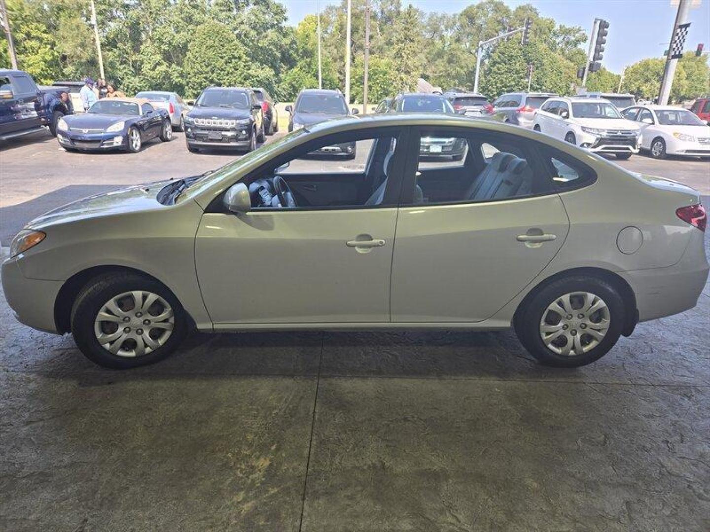 2009 Quicksilver Hyundai ELANTRA GLS (KMHDU46D79U) with an 2.0L I4 138hp 136ft. lbs. engine, Automatic transmission, located at 25355 Eames Street, Channahon, IL, 60410, (815) 467-1807, 41.429108, -88.228432 - Looking for a ride that's both economical and easy on the eyes? Look no further than the 2009 Hyundai ELANTRA SE! This baby is powered by a 2.0L I4 138hp 136ft. lbs. engine, meaning you'll have plenty of zip to get around town without breaking the bank on gas. Speaking of gas, with an impressive 25 - Photo#7