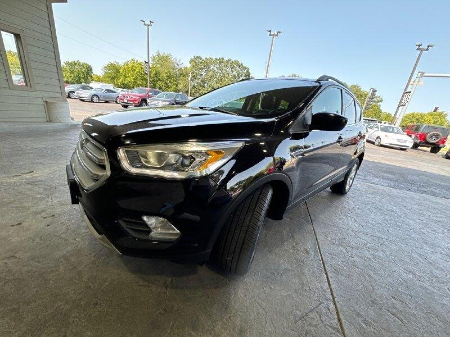 2018 Shadow Black Ford Escape SEL (1FMCU0HD3JU) with an EcoBoost 1.5L Turbo I4 179hp 177ft. lbs. engine, Automatic transmission, located at 25355 Eames Street, Channahon, IL, 60410, (815) 467-1807, 41.429108, -88.228432 - Introducing the stunning 2018 Ford Escape SEL, a vehicle that is sure to turn heads wherever you go! With its powerful EcoBoost 1.5L Turbo I4 179hp 177ft. lbs. engine, this SUV is designed to provide an exhilarating driving experience that will leave you wanting more. The factory default features - Photo#7