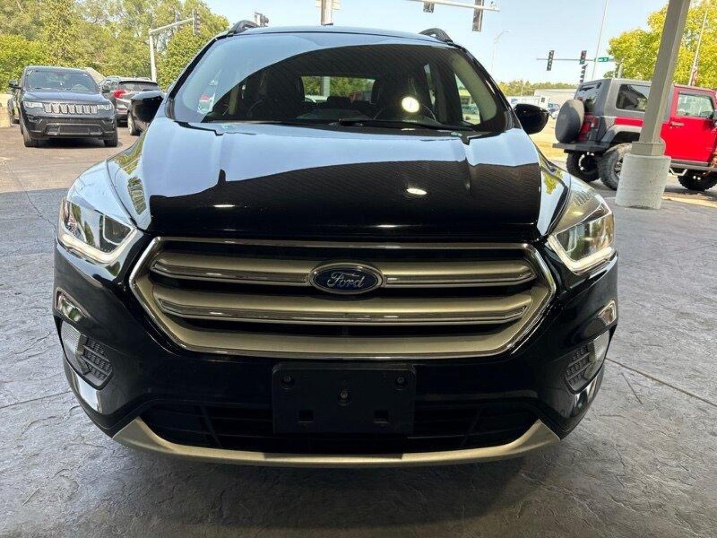 2018 Shadow Black Ford Escape SEL (1FMCU0HD3JU) with an EcoBoost 1.5L Turbo I4 179hp 177ft. lbs. engine, Automatic transmission, located at 25355 Eames Street, Channahon, IL, 60410, (815) 467-1807, 41.429108, -88.228432 - Introducing the stunning 2018 Ford Escape SEL, a vehicle that is sure to turn heads wherever you go! With its powerful EcoBoost 1.5L Turbo I4 179hp 177ft. lbs. engine, this SUV is designed to provide an exhilarating driving experience that will leave you wanting more. The factory default features - Photo#8