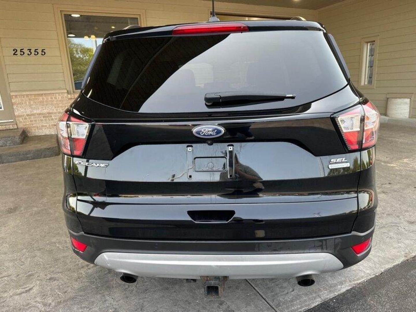 2018 Shadow Black Ford Escape SEL (1FMCU0HD3JU) with an EcoBoost 1.5L Turbo I4 179hp 177ft. lbs. engine, Automatic transmission, located at 25355 Eames Street, Channahon, IL, 60410, (815) 467-1807, 41.429108, -88.228432 - Introducing the stunning 2018 Ford Escape SEL, a vehicle that is sure to turn heads wherever you go! With its powerful EcoBoost 1.5L Turbo I4 179hp 177ft. lbs. engine, this SUV is designed to provide an exhilarating driving experience that will leave you wanting more. The factory default features - Photo#4