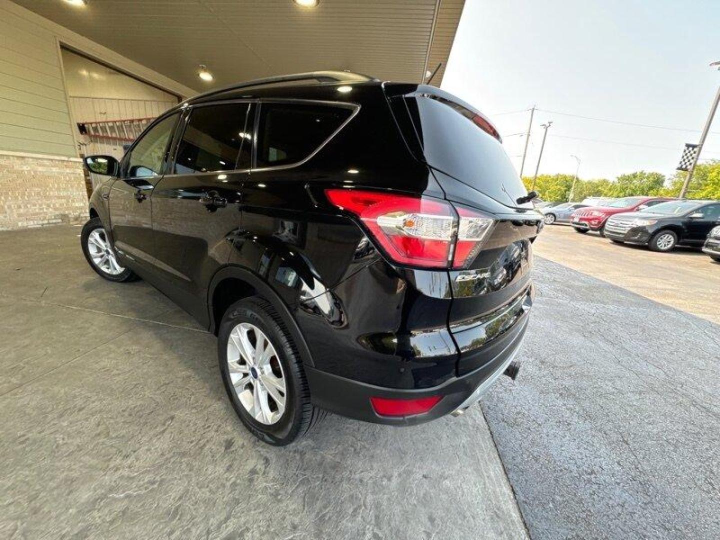 2018 Shadow Black Ford Escape SEL (1FMCU0HD3JU) with an EcoBoost 1.5L Turbo I4 179hp 177ft. lbs. engine, Automatic transmission, located at 25355 Eames Street, Channahon, IL, 60410, (815) 467-1807, 41.429108, -88.228432 - Introducing the stunning 2018 Ford Escape SEL, a vehicle that is sure to turn heads wherever you go! With its powerful EcoBoost 1.5L Turbo I4 179hp 177ft. lbs. engine, this SUV is designed to provide an exhilarating driving experience that will leave you wanting more. The factory default features - Photo#5