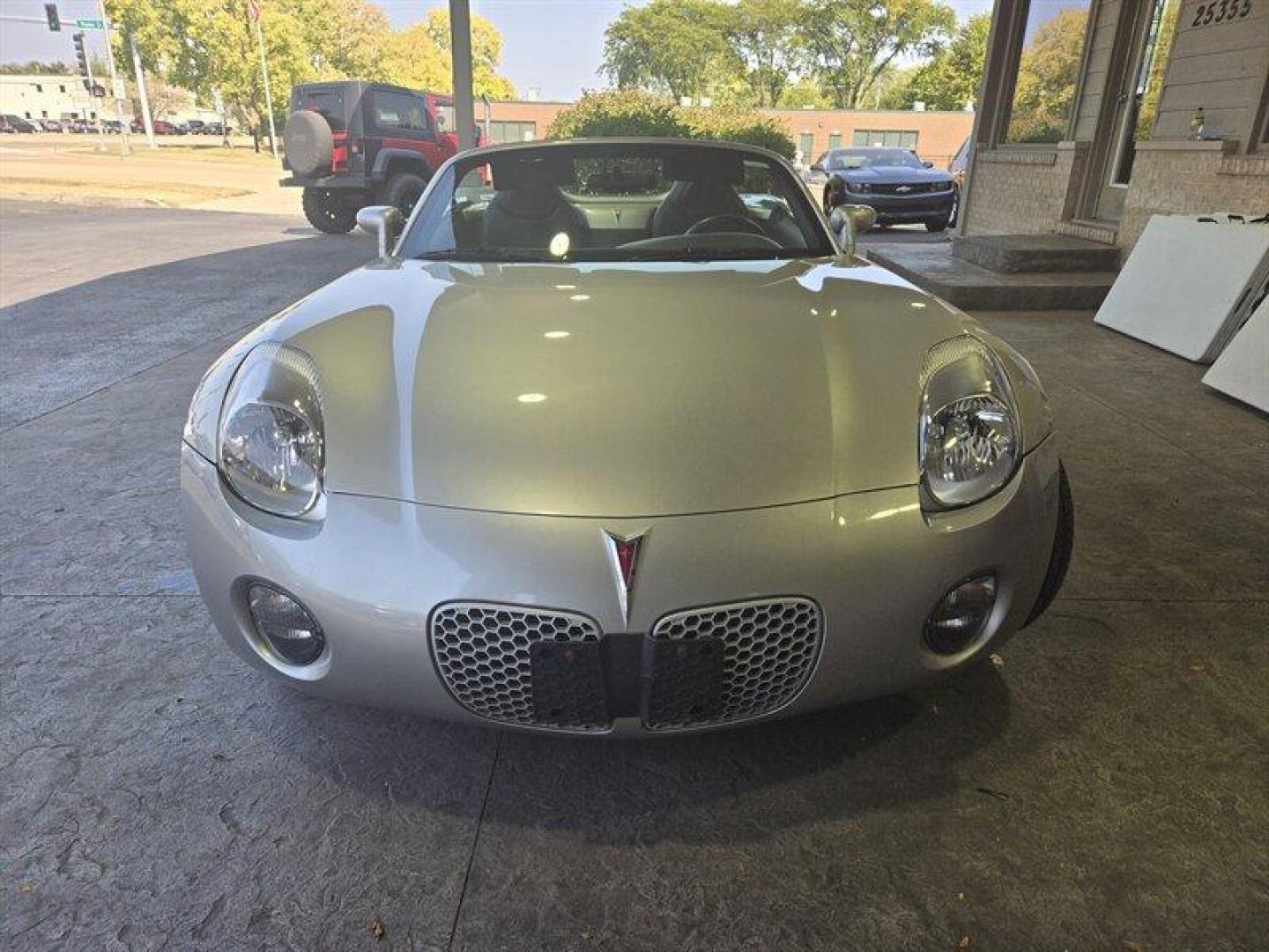 2006 Cool Pontiac Solstice (1G2MB35B26Y) with an 2L NA I4 double overhead cam (DOHC) 16V engine, 5 Speed Manual transmission, located at 25355 Eames Street, Channahon, IL, 60410, (815) 467-1807, 41.429108, -88.228432 - Looking for a car that's both stylish and efficient? Look no further than the 2006 Pontiac Solstice! This baby is powered by a 2L NA I4 double overhead cam (DOHC) 16V engine that'll have you zooming around town in style. And with less than 32,000 miles on the odometer, this car has barely been broke - Photo#10