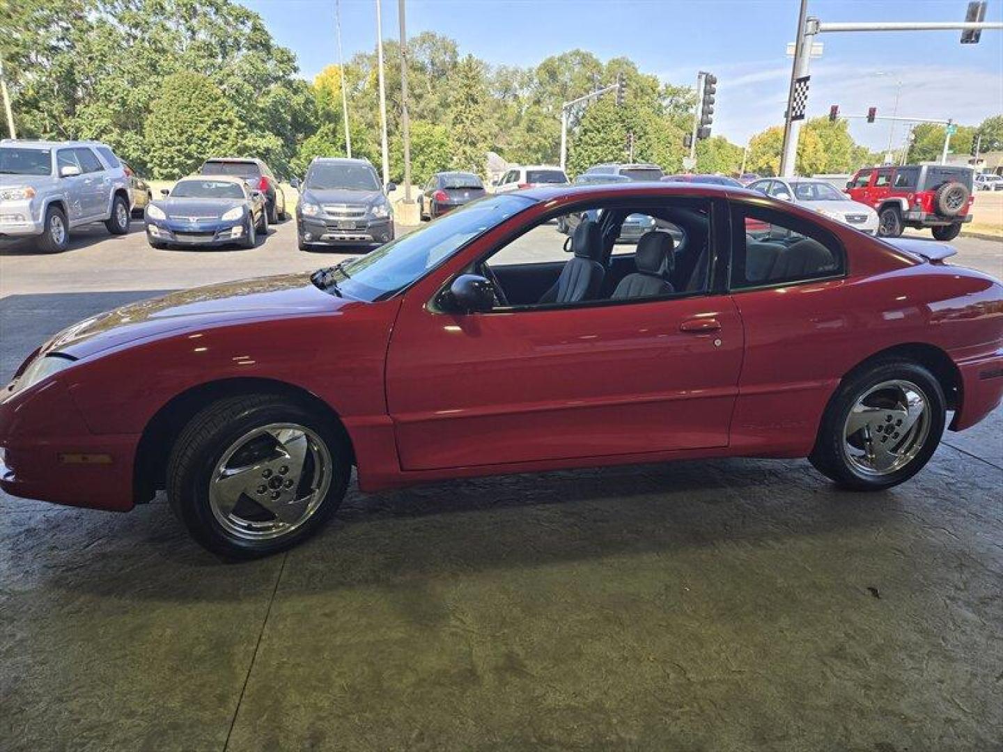 2005 Sport Red Metallic Pontiac Sunfire (3G2JB12F25S) with an 2.2L I4 140 hp 150ft. lbs. DOHC 16V engine, Automatic transmission, located at 25355 Eames Street, Channahon, IL, 60410, (815) 467-1807, 41.429108, -88.228432 - Looking for a ride that's as fun as it is functional? Look no further than the 2005 Pontiac Sunfire Special Value! With its sleek lines and sporty design, this car is sure to turn heads wherever you go. Under the hood, you'll find a powerful 2.2L I4 140 hp 150ft. lbs. DOHC 16V engine that's as reli - Photo#7