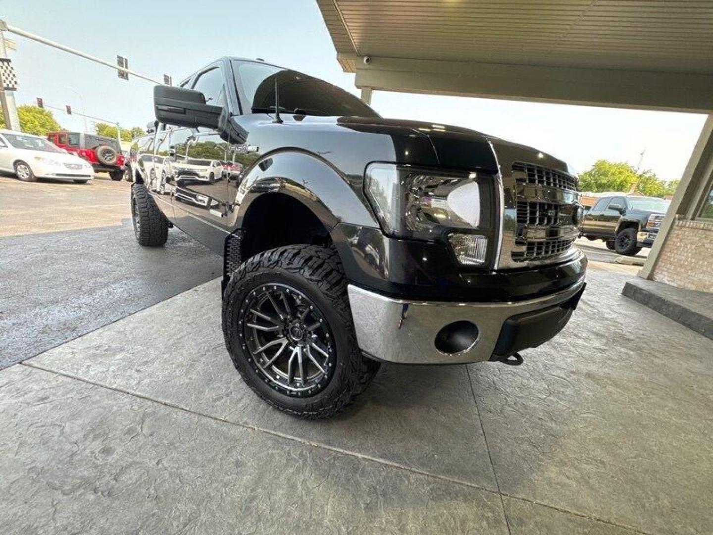 2014 Tuxedo Black Metallic Ford F-150 XLT (1FTFX1ET9EF) with an EcoBoost 3.5L Twin Turbo V6 365hp 420ft. lbs. engine, Automatic transmission, located at 25355 Eames Street, Channahon, IL, 60410, (815) 467-1807, 41.429108, -88.228432 - Looking for a powerful, yet fuel-efficient truck that won't let you down? Look no further than the 2014 Ford F-150 XLT. This bad boy is powered by an EcoBoost 3.5L Twin Turbo V6 engine that pumps out an impressive 365 horsepower and 420 ft-lbs of torque. With a factory default speed of zero to 60 mp - Photo#0