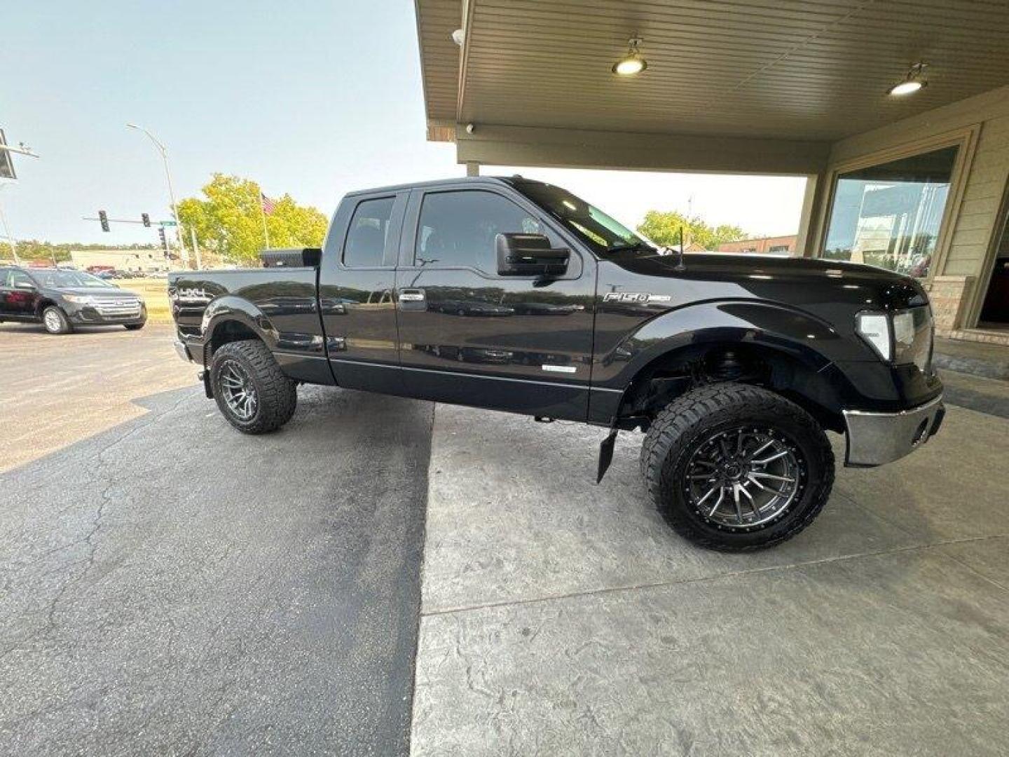 2014 Tuxedo Black Metallic Ford F-150 XLT (1FTFX1ET9EF) with an EcoBoost 3.5L Twin Turbo V6 365hp 420ft. lbs. engine, Automatic transmission, located at 25355 Eames Street, Channahon, IL, 60410, (815) 467-1807, 41.429108, -88.228432 - Looking for a powerful, yet fuel-efficient truck that won't let you down? Look no further than the 2014 Ford F-150 XLT. This bad boy is powered by an EcoBoost 3.5L Twin Turbo V6 engine that pumps out an impressive 365 horsepower and 420 ft-lbs of torque. With a factory default speed of zero to 60 mp - Photo#1