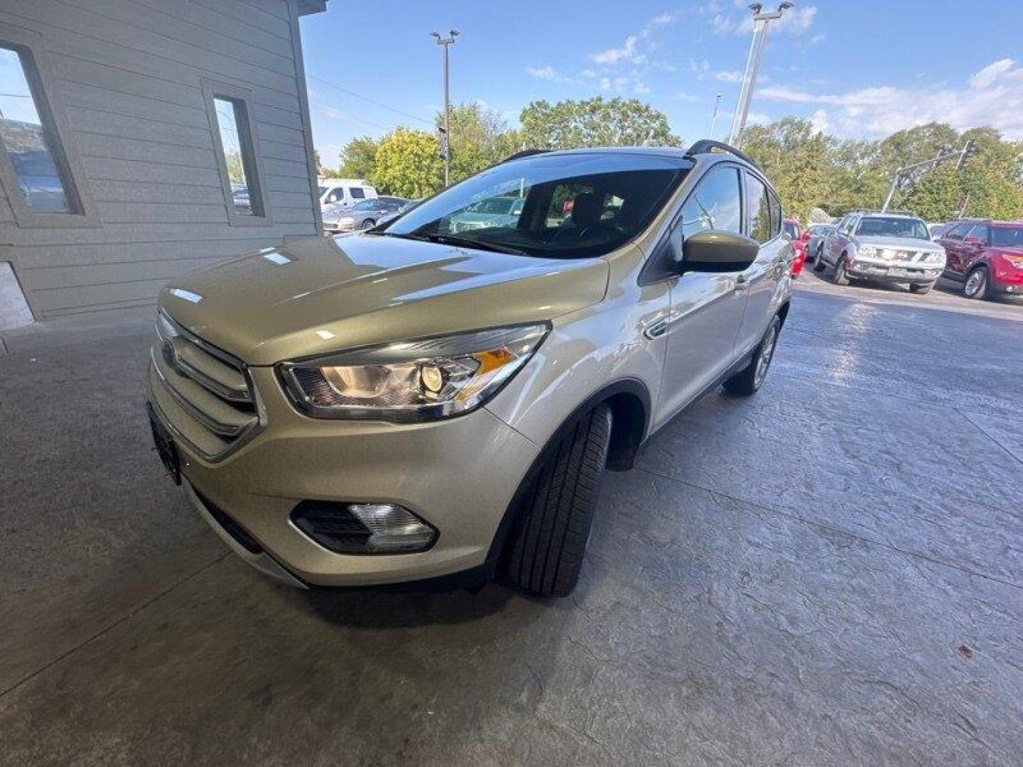 2018 White Gold Ford Escape SEL (1FMCU0HD0JU) with an EcoBoost 1.5L Turbo I4 179hp 177ft. lbs. engine, Automatic transmission, located at 25355 Eames Street, Channahon, IL, 60410, (815) 467-1807, 41.429108, -88.228432 - Looking for a compact SUV that delivers both style and performance? Look no further than the 2018 Ford Escape SEL! With a powerful EcoBoost 1.5L Turbo I4 engine that produces 179 horsepower and 177 ft. lbs. of torque, this vehicle is sure to impress. But that's not all the 2018 Ford Escape SEL als - Photo#8