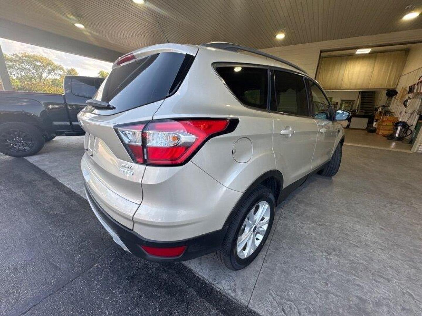 2018 White Gold Ford Escape SEL (1FMCU0HD0JU) with an EcoBoost 1.5L Turbo I4 179hp 177ft. lbs. engine, Automatic transmission, located at 25355 Eames Street, Channahon, IL, 60410, (815) 467-1807, 41.429108, -88.228432 - Looking for a compact SUV that delivers both style and performance? Look no further than the 2018 Ford Escape SEL! With a powerful EcoBoost 1.5L Turbo I4 engine that produces 179 horsepower and 177 ft. lbs. of torque, this vehicle is sure to impress. But that's not all the 2018 Ford Escape SEL als - Photo#4