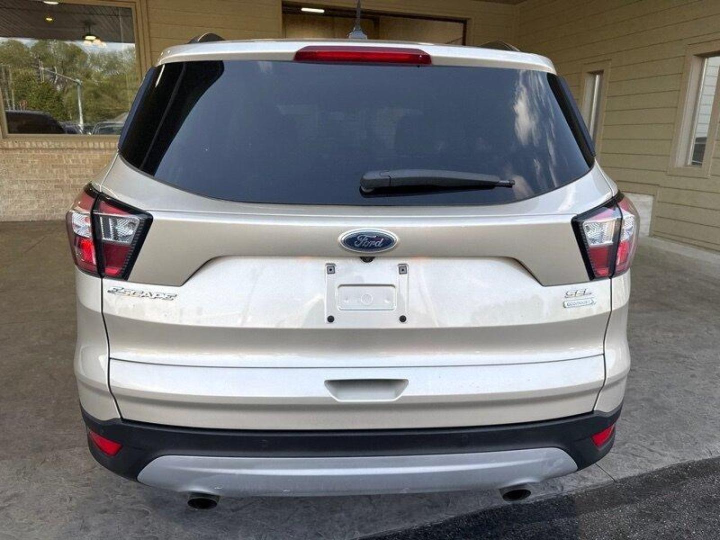 2018 White Gold Ford Escape SEL (1FMCU0HD0JU) with an EcoBoost 1.5L Turbo I4 179hp 177ft. lbs. engine, Automatic transmission, located at 25355 Eames Street, Channahon, IL, 60410, (815) 467-1807, 41.429108, -88.228432 - Looking for a compact SUV that delivers both style and performance? Look no further than the 2018 Ford Escape SEL! With a powerful EcoBoost 1.5L Turbo I4 engine that produces 179 horsepower and 177 ft. lbs. of torque, this vehicle is sure to impress. But that's not all the 2018 Ford Escape SEL als - Photo#5