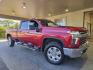 2021 Red Hot Chevrolet Silverado 3500 LTZ (1GC4YUEY8MF) with an Duramax 6.6L Biodiesel Turbo V8 445hp 910ft. lbs. engine, Automatic transmission, located at 25355 Eames Street, Channahon, IL, 60410, (815) 467-1807, 41.429108, -88.228432 - Oh, baby, buckle up and get ready to experience the ultimate trucking experience with the 2021 Chevrolet Silverado 3500 LTZ. This beast is powered by a Duramax 6.6L Biodiesel Turbo V8 engine that delivers a whopping 445hp and 910ft. lbs. of torque - that's more than enough power to conquer any terra - Photo#0