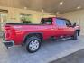 2021 Red Hot Chevrolet Silverado 3500 LTZ (1GC4YUEY8MF) with an Duramax 6.6L Biodiesel Turbo V8 445hp 910ft. lbs. engine, Automatic transmission, located at 25355 Eames Street, Channahon, IL, 60410, (815) 467-1807, 41.429108, -88.228432 - Oh, baby, buckle up and get ready to experience the ultimate trucking experience with the 2021 Chevrolet Silverado 3500 LTZ. This beast is powered by a Duramax 6.6L Biodiesel Turbo V8 engine that delivers a whopping 445hp and 910ft. lbs. of torque - that's more than enough power to conquer any terra - Photo#3