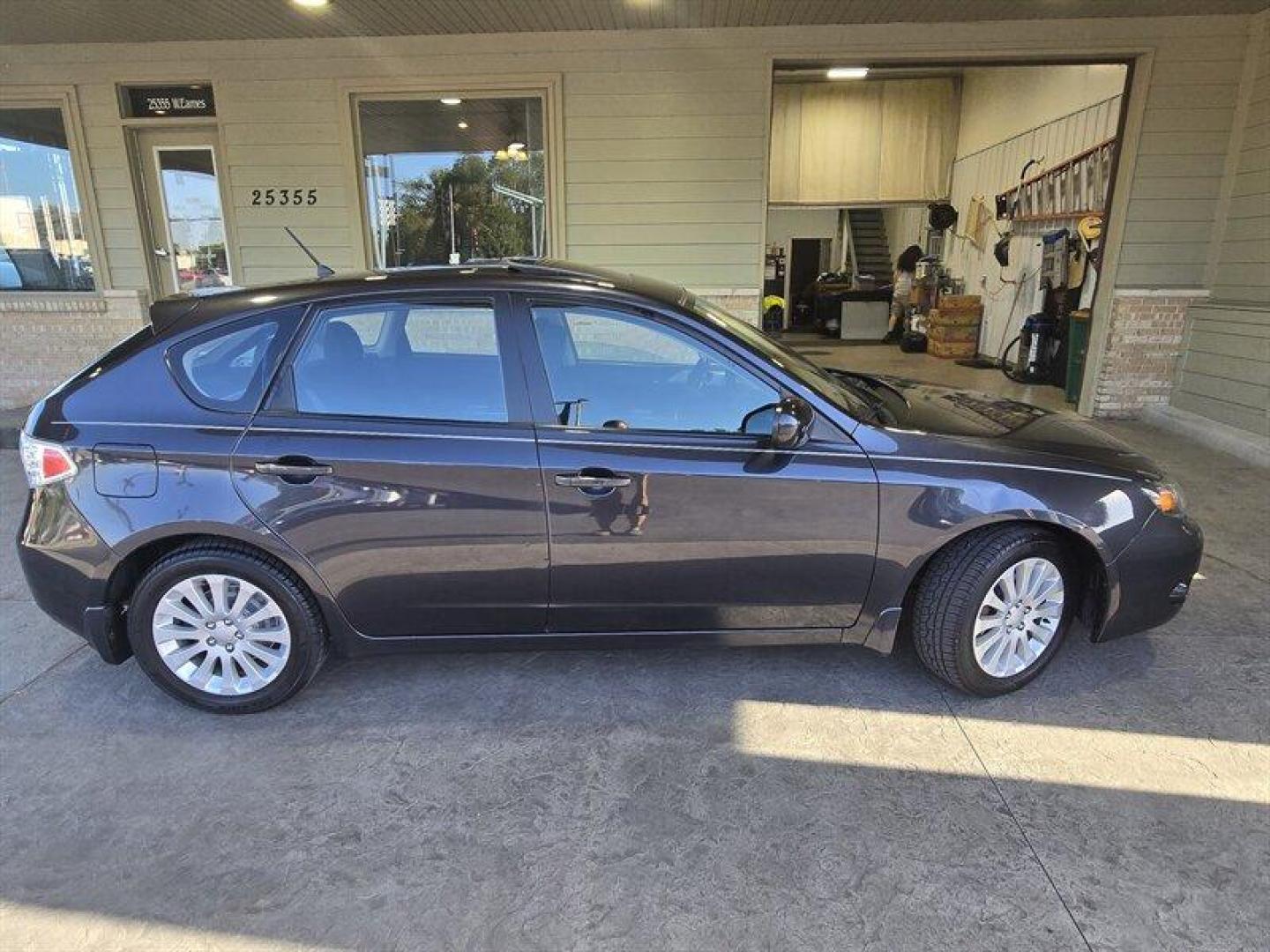 2011 Obsidian Black Pearl Subaru Impreza 2.5i Premium (JF1GH6B65BH) with an 2.5L H4 170hp 170ft. lbs. engine, Automatic transmission, located at 25355 Eames Street, Channahon, IL, 60410, (815) 467-1807, 41.429108, -88.228432 - Introducing the 2011 Subaru Impreza 2.5i Premium - a car that surpasses expectations and sets the benchmark for performance and style. This vehicle boasts a 2.5L H4 170hp 170ft. lbs. engine, delivering a thrilling driving experience that is both powerful and responsive. With less than 45,000 miles - Photo#2