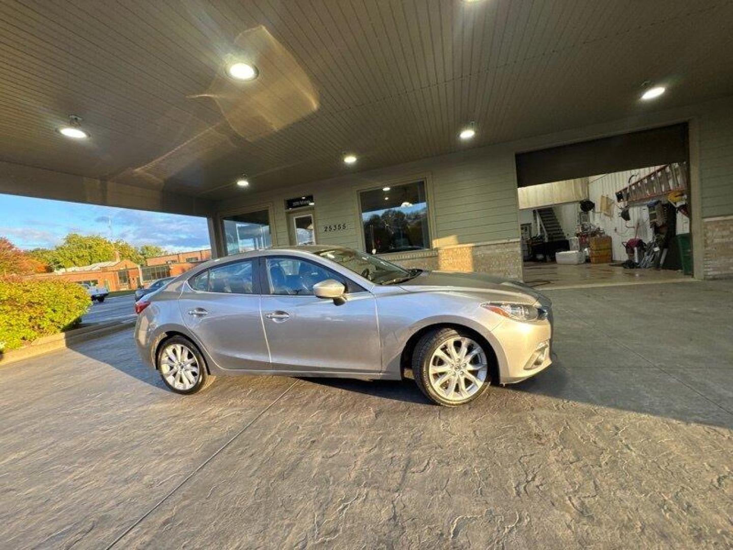 2015 Liquid Silver Metallic Mazda Mazda3 s Touring (JM1BM1V31F1) with an SKYACTIV-G 2.5L I4 184hp 185ft. lbs. engine, Automatic transmission, located at 25355 Eames Street, Channahon, IL, 60410, (815) 467-1807, 41.429108, -88.228432 - Introducing the 2015 Mazda Mazda3 s Touring! This sleek and stylish sedan is a fantastic choice for anyone looking for a reliable and efficient vehicle. With a powerful SKYACTIV-G 2.5L I4 engine, this car packs a punch with 184 horsepower and 185ft. lbs. of torque. The Liquid Silver Metallic exter - Photo#2