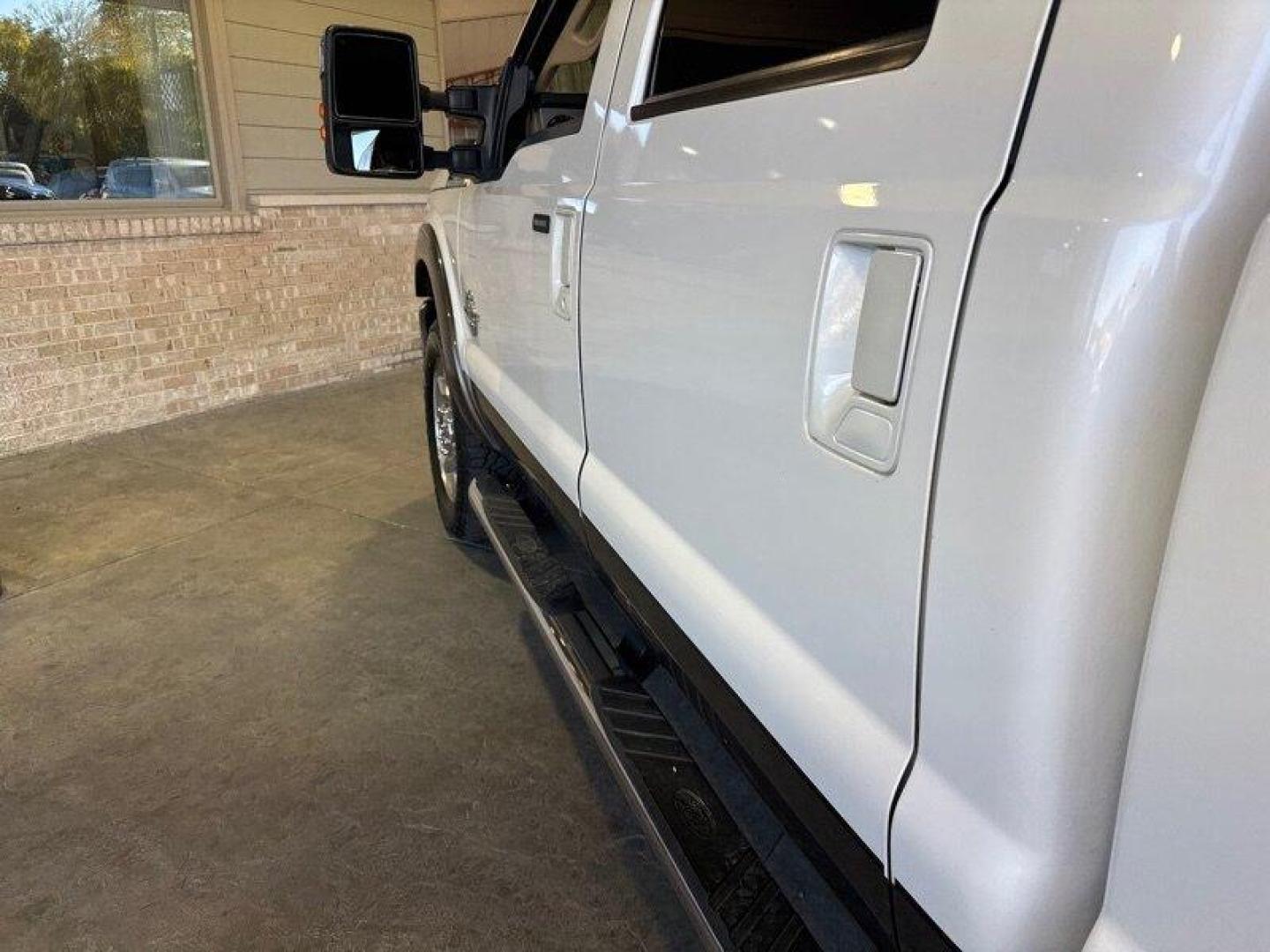 2015 White Platinum Metallic Tri-Coat Ford F-250 Lariat (1FT7W2BT5FE) with an Power Stroke 6.7L Biodiesel Turbo V8 440hp 860ft. engine, Automatic transmission, located at 25355 Eames Street, Channahon, IL, 60410, (815) 467-1807, 41.429108, -88.228432 - Introducing the mighty 2015 Ford F-250 Super Duty Lariat - an absolute beast of a truck that is sure to turn heads wherever you go! This beauty is powered by a robust Power Stroke 6.7L Biodiesel Turbo V8 engine, delivering an impressive 440hp and 860ft. of torque. With this powerful engine, you can - Photo#8