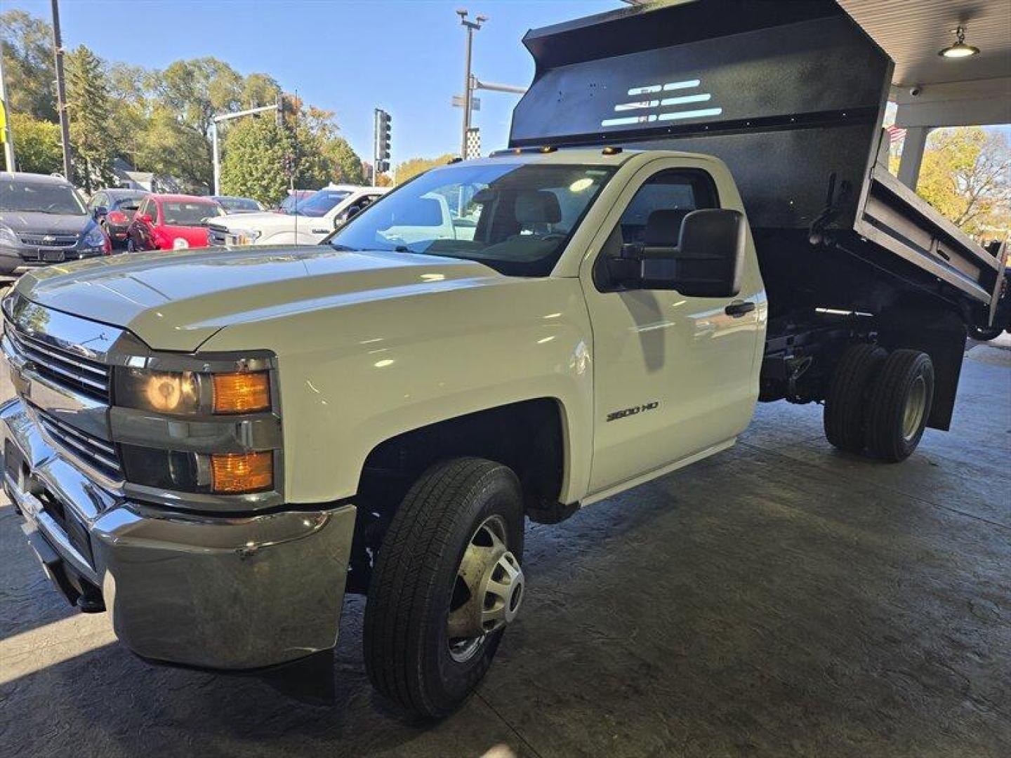 2015 White Chevrolet Silverado 3500 Work Truck (1GB3CYCGXFF) with an 6.0L V8 322hp 380ft. lbs. engine, located at 25355 Eames Street, Channahon, IL, 60410, (815) 467-1807, 41.429108, -88.228432 - ** MONROE 11 FOOT DUMP BODY. ** Introducing a 2015 Chevrolet Silverado 3500 Work Truck with a powerful 6.0L V8 engine that delivers 322 horsepower and 380 ft. lbs. of torque. This vehicle is equipped with factory default features that provide a comfortable and practical driving experience. The exte - Photo#9