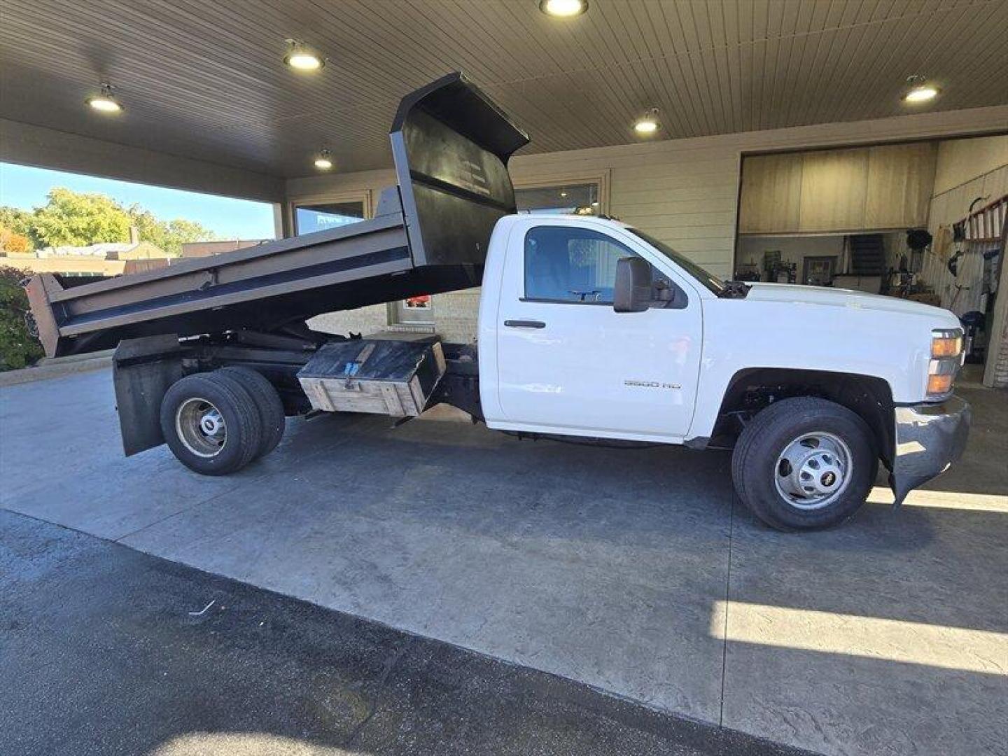 2015 White Chevrolet Silverado 3500 Work Truck (1GB3CYCGXFF) with an 6.0L V8 322hp 380ft. lbs. engine, located at 25355 Eames Street, Channahon, IL, 60410, (815) 467-1807, 41.429108, -88.228432 - ** MONROE 11 FOOT DUMP BODY. ** Introducing a 2015 Chevrolet Silverado 3500 Work Truck with a powerful 6.0L V8 engine that delivers 322 horsepower and 380 ft. lbs. of torque. This vehicle is equipped with factory default features that provide a comfortable and practical driving experience. The exte - Photo#1