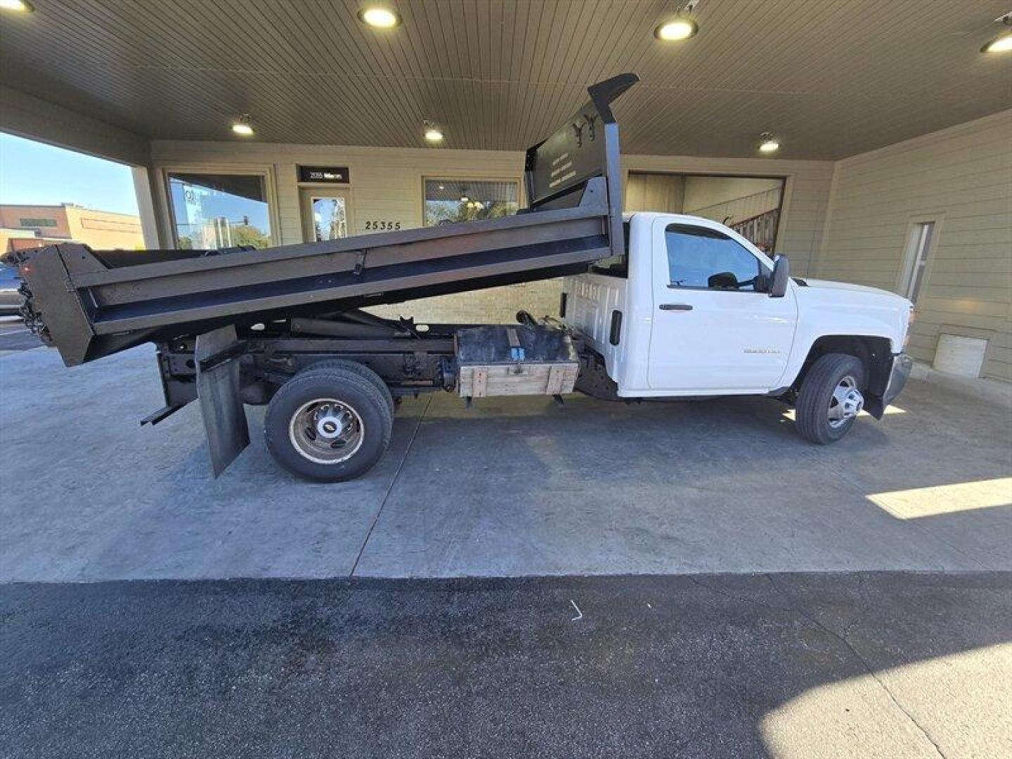 2015 White Chevrolet Silverado 3500 Work Truck (1GB3CYCGXFF) with an 6.0L V8 322hp 380ft. lbs. engine, located at 25355 Eames Street, Channahon, IL, 60410, (815) 467-1807, 41.429108, -88.228432 - ** MONROE 11 FOOT DUMP BODY. ** Introducing a 2015 Chevrolet Silverado 3500 Work Truck with a powerful 6.0L V8 engine that delivers 322 horsepower and 380 ft. lbs. of torque. This vehicle is equipped with factory default features that provide a comfortable and practical driving experience. The exte - Photo#2