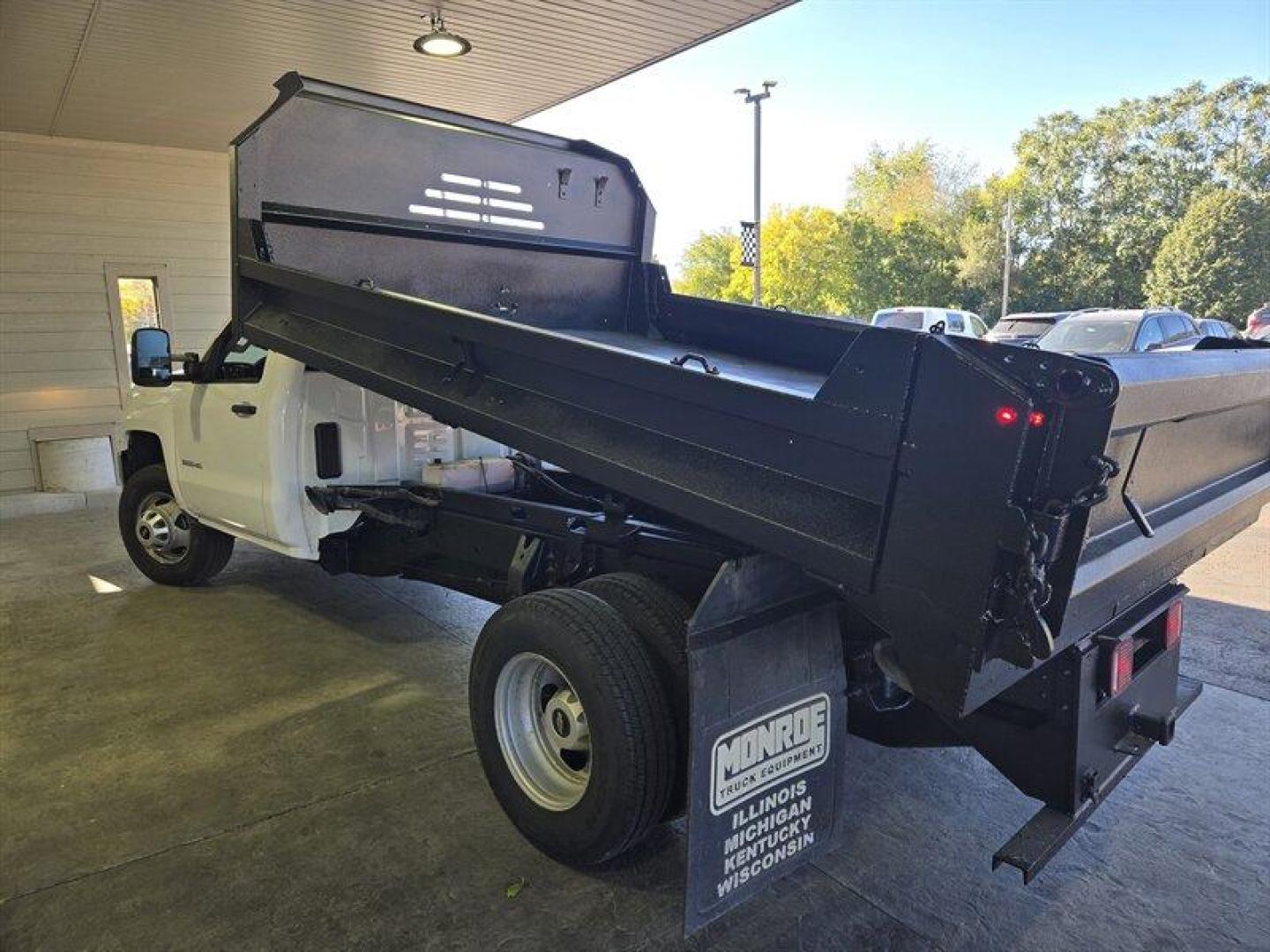 2015 White Chevrolet Silverado 3500 Work Truck (1GB3CYCGXFF) with an 6.0L V8 322hp 380ft. lbs. engine, located at 25355 Eames Street, Channahon, IL, 60410, (815) 467-1807, 41.429108, -88.228432 - ** MONROE 11 FOOT DUMP BODY. ** Introducing a 2015 Chevrolet Silverado 3500 Work Truck with a powerful 6.0L V8 engine that delivers 322 horsepower and 380 ft. lbs. of torque. This vehicle is equipped with factory default features that provide a comfortable and practical driving experience. The exte - Photo#6