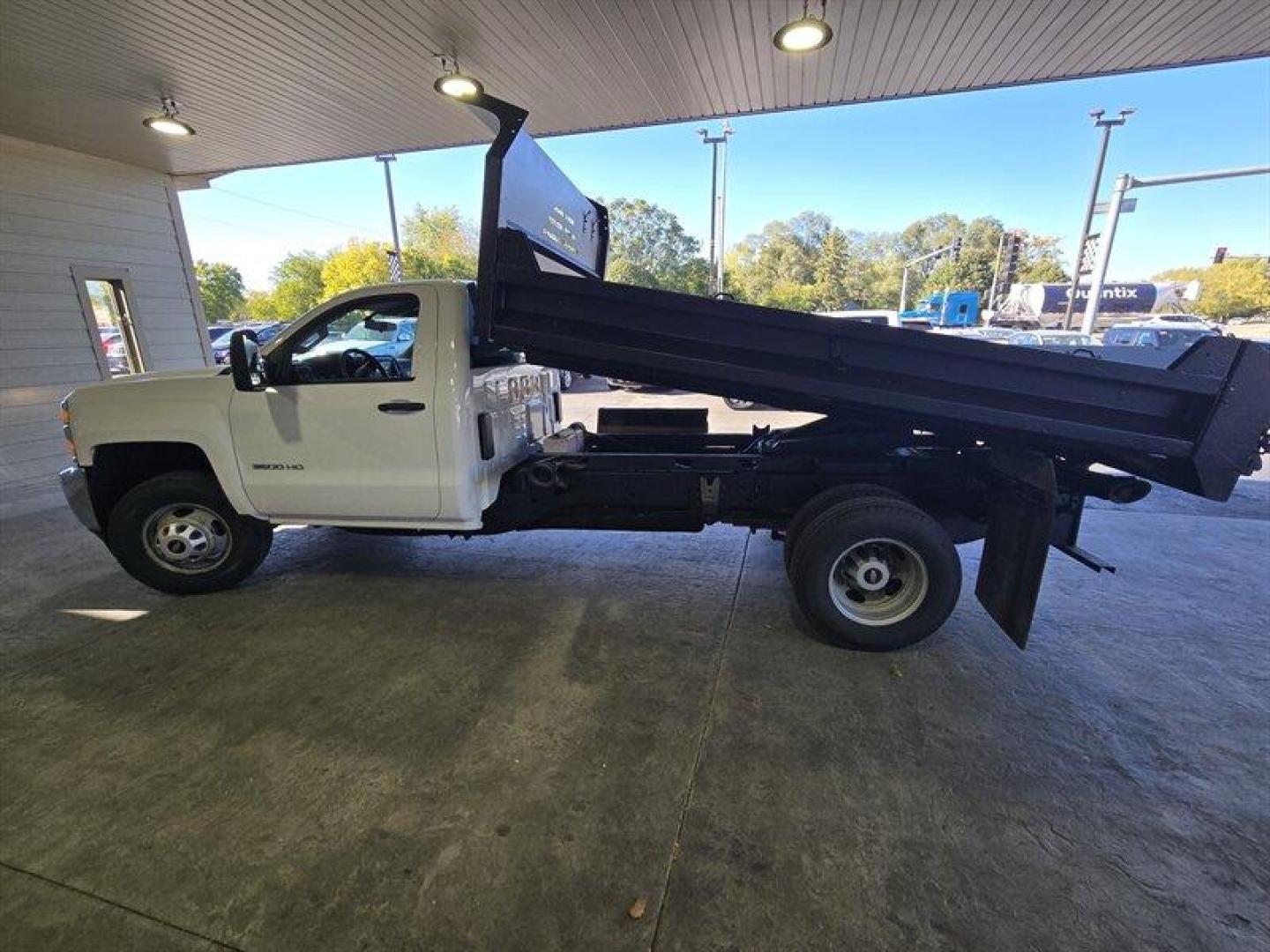 2015 White Chevrolet Silverado 3500 Work Truck (1GB3CYCGXFF) with an 6.0L V8 322hp 380ft. lbs. engine, located at 25355 Eames Street, Channahon, IL, 60410, (815) 467-1807, 41.429108, -88.228432 - ** MONROE 11 FOOT DUMP BODY. ** Introducing a 2015 Chevrolet Silverado 3500 Work Truck with a powerful 6.0L V8 engine that delivers 322 horsepower and 380 ft. lbs. of torque. This vehicle is equipped with factory default features that provide a comfortable and practical driving experience. The exte - Photo#7