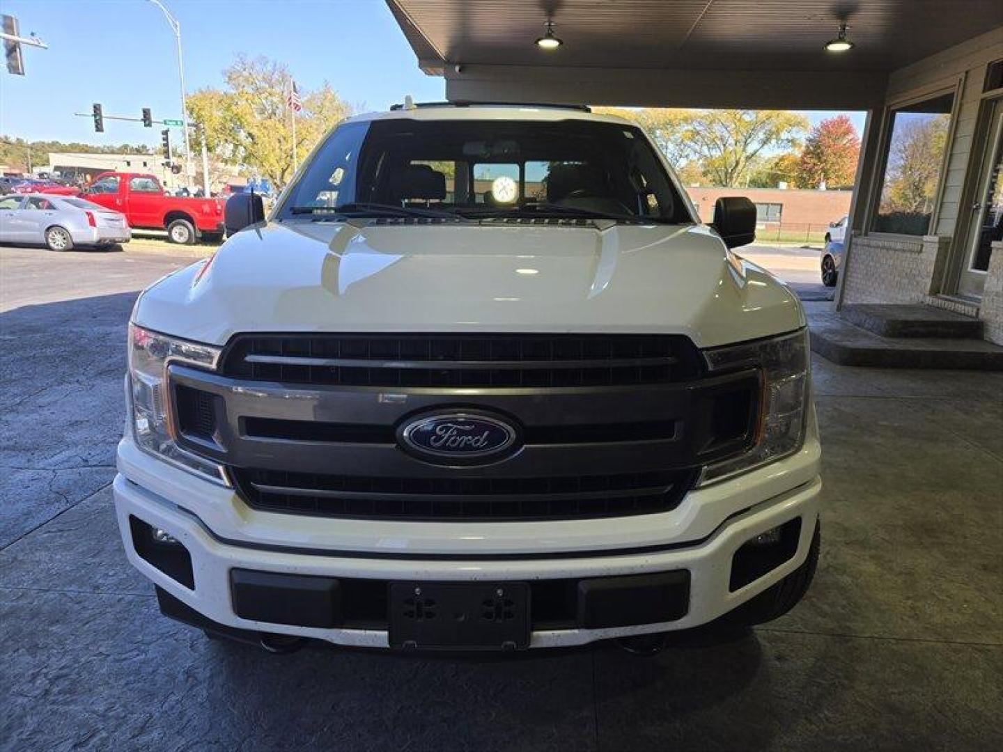 2018 Oxford White Ford F-150 XLT (1FTEW1EG4JF) with an EcoBoost 3.5L Twin Turbo V6 375hp 470ft. lbs. engine, Automatic transmission, located at 25355 Eames Street, Channahon, IL, 60410, (815) 467-1807, 41.429108, -88.228432 - Introducing a 2018 Ford F-150 XLT that boasts a powerful EcoBoost 3.5L Twin Turbo V6 375hp 470ft. lbs. engine. The vehicle comes in a sleek Shadow Black/Magnetic exterior and a comfortable Medium Light Camel interior. This truck has been well-maintained and is in excellent overall condition. The F - Photo#11