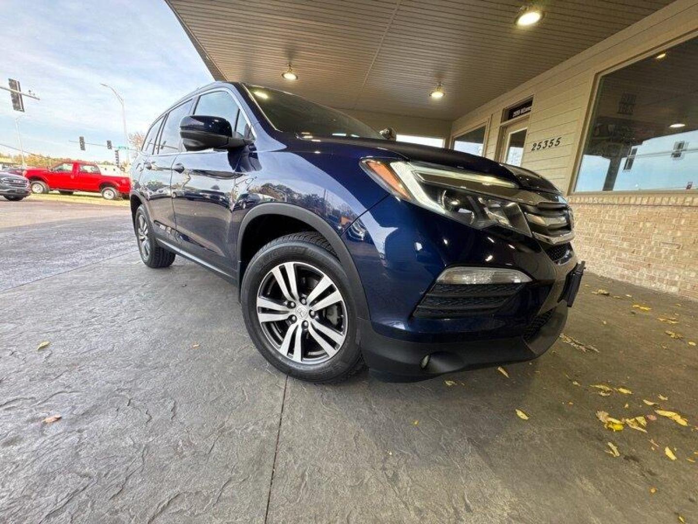 2016 Obsidian Blue Pearl Honda Pilot EX-L (5FNYF6H5XGB) with an 3.5L V6 280hp 262ft. lbs. engine, Automatic transmission, located at 25355 Eames Street, Channahon, IL, 60410, (815) 467-1807, 41.429108, -88.228432 - Oh, honey, let me tell you about the 2016 Honda Pilot EX-L. This beauty is a real powerhouse, boasting a 3.5L V6 engine that pumps out 280 horses and 262ft. lbs. of torque. Talk about some serious oomph! Now, let's talk about the factory default features. This bad boy comes with a whole slew of goo - Photo#0