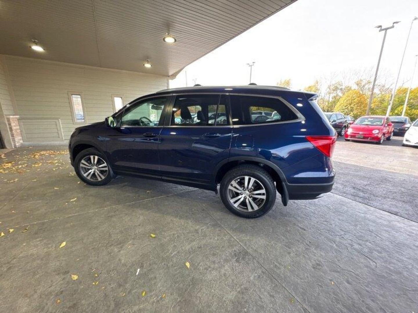 2016 Obsidian Blue Pearl Honda Pilot EX-L (5FNYF6H5XGB) with an 3.5L V6 280hp 262ft. lbs. engine, Automatic transmission, located at 25355 Eames Street, Channahon, IL, 60410, (815) 467-1807, 41.429108, -88.228432 - Oh, honey, let me tell you about the 2016 Honda Pilot EX-L. This beauty is a real powerhouse, boasting a 3.5L V6 engine that pumps out 280 horses and 262ft. lbs. of torque. Talk about some serious oomph! Now, let's talk about the factory default features. This bad boy comes with a whole slew of goo - Photo#7