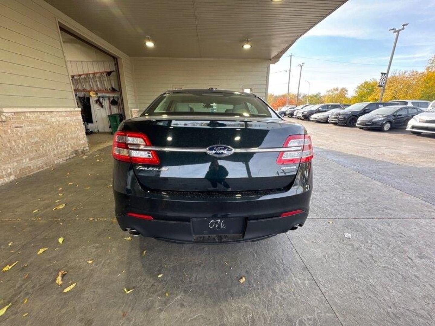 2014 Sterling Gray Metallic Ford Taurus SE (1FAHP2D89EG) with an 3.5L V6 288hp 254ft. lbs. engine, Automatic transmission, located at 25355 Eames Street, Channahon, IL, 60410, (815) 467-1807, 41.429108, -88.228432 - Looking for a sleek and powerful sedan that won't break the bank? Look no further than the 2014 Ford Taurus SE! With a 3.5L V6 engine that delivers an impressive 288 horsepower and 254 ft. lbs. of torque, this car is built to perform. But the Taurus isn't just about power - it's also packed with a - Photo#4