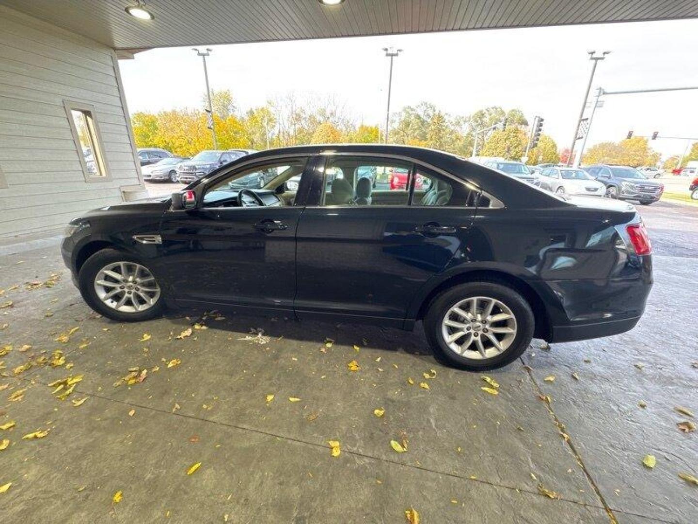 2014 Sterling Gray Metallic Ford Taurus SE (1FAHP2D89EG) with an 3.5L V6 288hp 254ft. lbs. engine, Automatic transmission, located at 25355 Eames Street, Channahon, IL, 60410, (815) 467-1807, 41.429108, -88.228432 - Looking for a sleek and powerful sedan that won't break the bank? Look no further than the 2014 Ford Taurus SE! With a 3.5L V6 engine that delivers an impressive 288 horsepower and 254 ft. lbs. of torque, this car is built to perform. But the Taurus isn't just about power - it's also packed with a - Photo#6