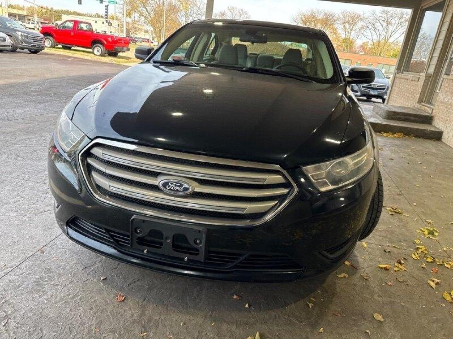 2014 Sterling Gray Metallic Ford Taurus SE (1FAHP2D89EG) with an 3.5L V6 288hp 254ft. lbs. engine, Automatic transmission, located at 25355 Eames Street, Channahon, IL, 60410, (815) 467-1807, 41.429108, -88.228432 - Looking for a sleek and powerful sedan that won't break the bank? Look no further than the 2014 Ford Taurus SE! With a 3.5L V6 engine that delivers an impressive 288 horsepower and 254 ft. lbs. of torque, this car is built to perform. But the Taurus isn't just about power - it's also packed with a - Photo#8