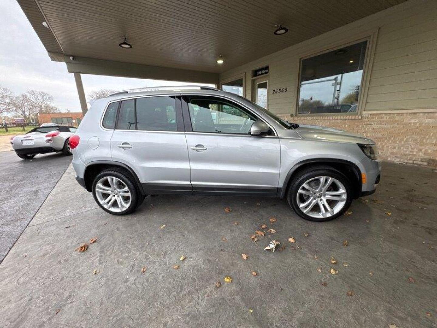 2013 Reflex Silver Metallic Volkswagen Tiguan SEL 4Motion (WVGBV7AX9DW) with an 2.0L Turbo I4 200hp 207ft. lbs. engine, TipTronic transmission, located at 25355 Eames Street, Channahon, IL, 60410, (815) 467-1807, 41.429108, -88.228432 - Photo#2