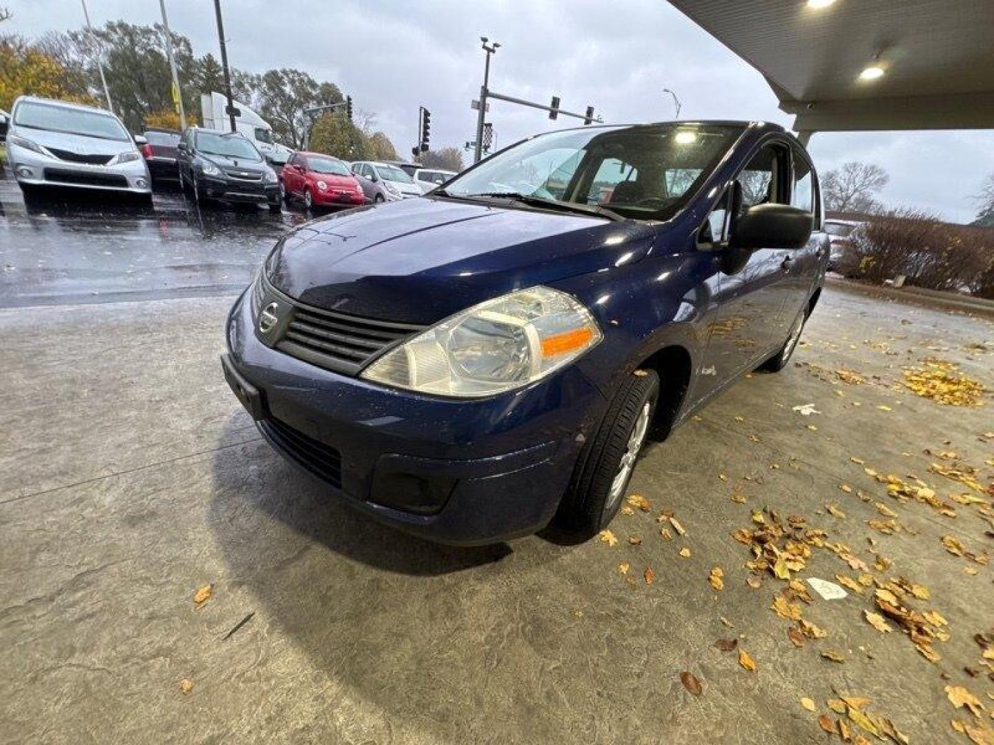 2009 Blue Onyx Nissan Versa 1.6 (3N1CC11EX9L) with an 1.6L I4 107hp 111ft. lbs. engine, Automatic transmission, located at 25355 Eames Street, Channahon, IL, 60410, (815) 467-1807, 41.429108, -88.228432 - Looking for a reliable and efficient car that won't break the bank? Look no further than this 2009 Nissan Versa 1.6 Base! Powered by a 1.6L I4 engine with 107 horsepower and 111 ft. lbs. of torque, this car will get you where you need to go with ease. But what really sets this car apart are its fac - Photo#7