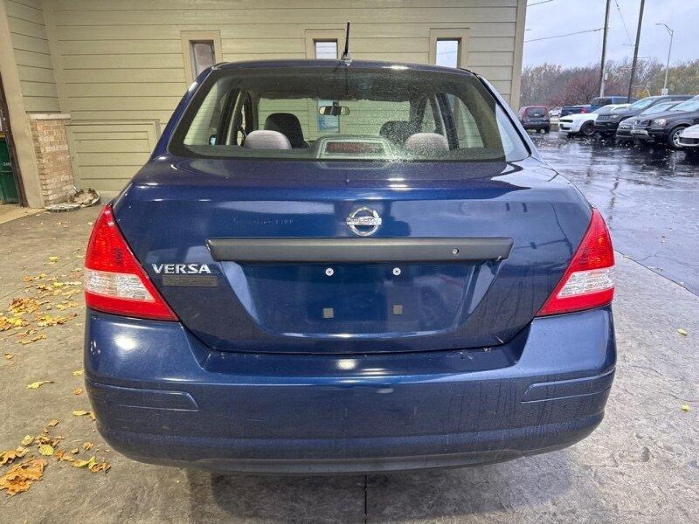 2009 Blue Onyx Nissan Versa 1.6 (3N1CC11EX9L) with an 1.6L I4 107hp 111ft. lbs. engine, Automatic transmission, located at 25355 Eames Street, Channahon, IL, 60410, (815) 467-1807, 41.429108, -88.228432 - Looking for a reliable and efficient car that won't break the bank? Look no further than this 2009 Nissan Versa 1.6 Base! Powered by a 1.6L I4 engine with 107 horsepower and 111 ft. lbs. of torque, this car will get you where you need to go with ease. But what really sets this car apart are its fac - Photo#4