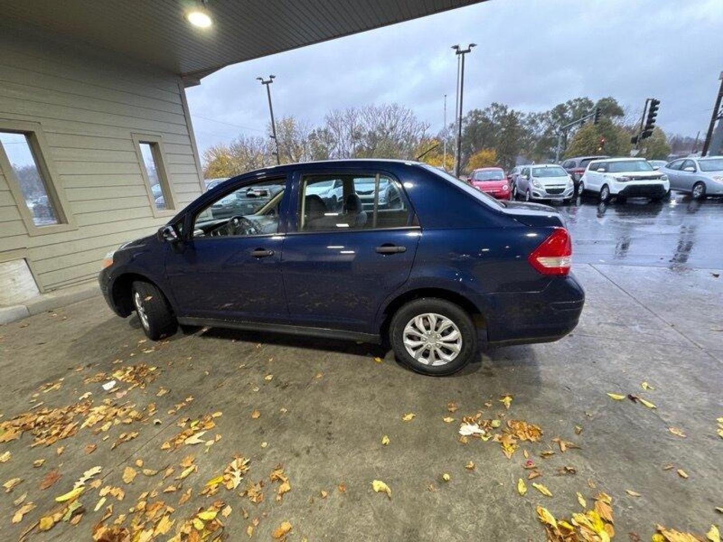 2009 Blue Onyx Nissan Versa 1.6 (3N1CC11EX9L) with an 1.6L I4 107hp 111ft. lbs. engine, Automatic transmission, located at 25355 Eames Street, Channahon, IL, 60410, (815) 467-1807, 41.429108, -88.228432 - Looking for a reliable and efficient car that won't break the bank? Look no further than this 2009 Nissan Versa 1.6 Base! Powered by a 1.6L I4 engine with 107 horsepower and 111 ft. lbs. of torque, this car will get you where you need to go with ease. But what really sets this car apart are its fac - Photo#6