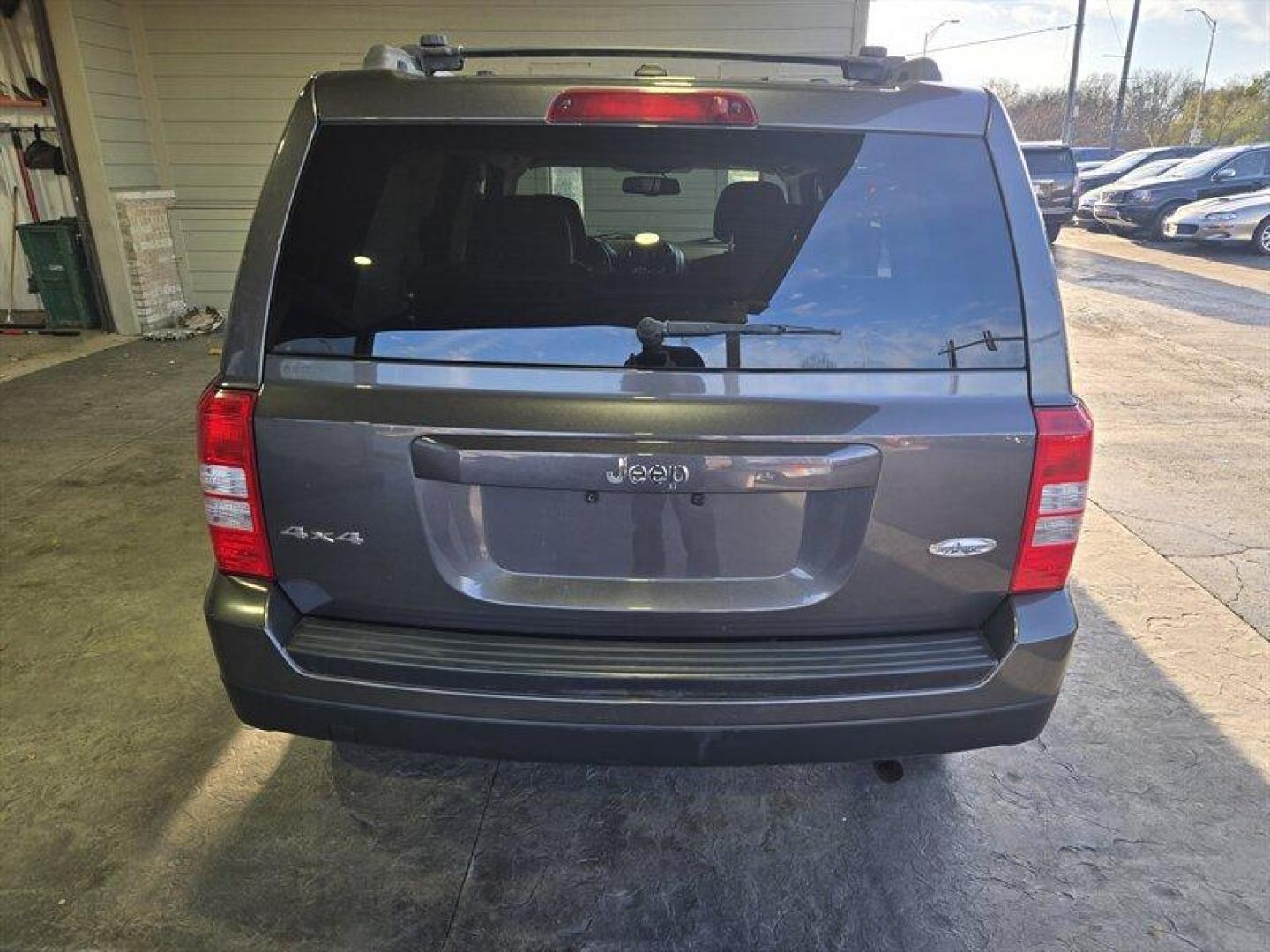 2015 Granite Crystal Metallic Clear Coat Jeep Patriot High Altitude (1C4NJRFB7FD) with an 2.4L I4 172hp 165ft. lbs. engine, Automatic transmission, located at 25355 Eames Street, Channahon, IL, 60410, (815) 467-1807, 41.429108, -88.228432 - Introducing a 2015 Jeep Patriot High Altitude in Granite Crystal Metallic Clear Coat with a Dark Slate Gray interior. This SUV is powered by a 2.4L I4 172hp 165ft. lbs. engine and has an impressive mileage of below 69,000 miles, averaging less than 7,000 miles per year. This vehicle offers a great c - Photo#4