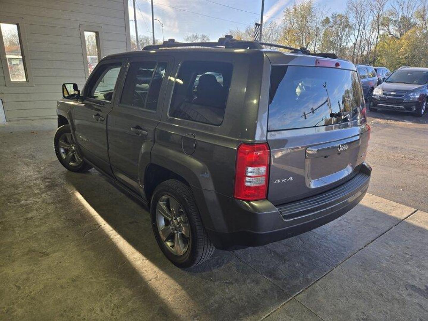 2015 Granite Crystal Metallic Clear Coat Jeep Patriot High Altitude (1C4NJRFB7FD) with an 2.4L I4 172hp 165ft. lbs. engine, Automatic transmission, located at 25355 Eames Street, Channahon, IL, 60410, (815) 467-1807, 41.429108, -88.228432 - Introducing a 2015 Jeep Patriot High Altitude in Granite Crystal Metallic Clear Coat with a Dark Slate Gray interior. This SUV is powered by a 2.4L I4 172hp 165ft. lbs. engine and has an impressive mileage of below 69,000 miles, averaging less than 7,000 miles per year. This vehicle offers a great c - Photo#5