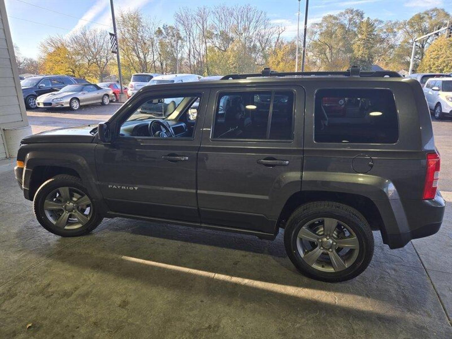 2015 Granite Crystal Metallic Clear Coat Jeep Patriot High Altitude (1C4NJRFB7FD) with an 2.4L I4 172hp 165ft. lbs. engine, Automatic transmission, located at 25355 Eames Street, Channahon, IL, 60410, (815) 467-1807, 41.429108, -88.228432 - Introducing a 2015 Jeep Patriot High Altitude in Granite Crystal Metallic Clear Coat with a Dark Slate Gray interior. This SUV is powered by a 2.4L I4 172hp 165ft. lbs. engine and has an impressive mileage of below 69,000 miles, averaging less than 7,000 miles per year. This vehicle offers a great c - Photo#6