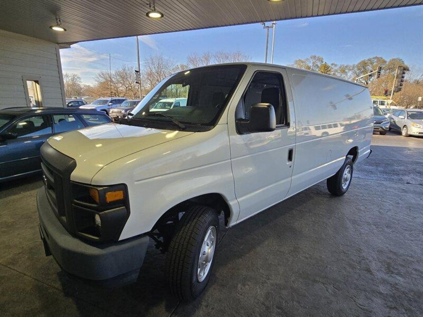 2013 Oxford White Ford Commercial (1FTNS1EW3DD) with an Triton 4.6L Flex Fuel V8 225hp 286ft. lbs. engine, Automatic transmission, located at 25355 Eames Street, Channahon, IL, 60410, (815) 467-1807, 41.429108, -88.228432 - ** HARD TO FIND EXTENDED AND ONLY 5,000 MILES. ** This 2013 Ford E-150 boasts a powerful Triton 4.6L Flex Fuel V8 engine, capable of producing 225 horsepower and 286 ft. lbs. of torque. With its low mileage of less than 6,000 miles and averaging less than 1,000 miles per year, this vehicle is in exc - Photo#9