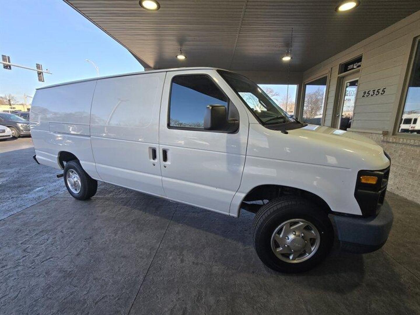 2013 Oxford White Ford Commercial (1FTNS1EW3DD) with an Triton 4.6L Flex Fuel V8 225hp 286ft. lbs. engine, Automatic transmission, located at 25355 Eames Street, Channahon, IL, 60410, (815) 467-1807, 41.429108, -88.228432 - ** HARD TO FIND EXTENDED AND ONLY 5,000 MILES. ** This 2013 Ford E-150 boasts a powerful Triton 4.6L Flex Fuel V8 engine, capable of producing 225 horsepower and 286 ft. lbs. of torque. With its low mileage of less than 6,000 miles and averaging less than 1,000 miles per year, this vehicle is in exc - Photo#1