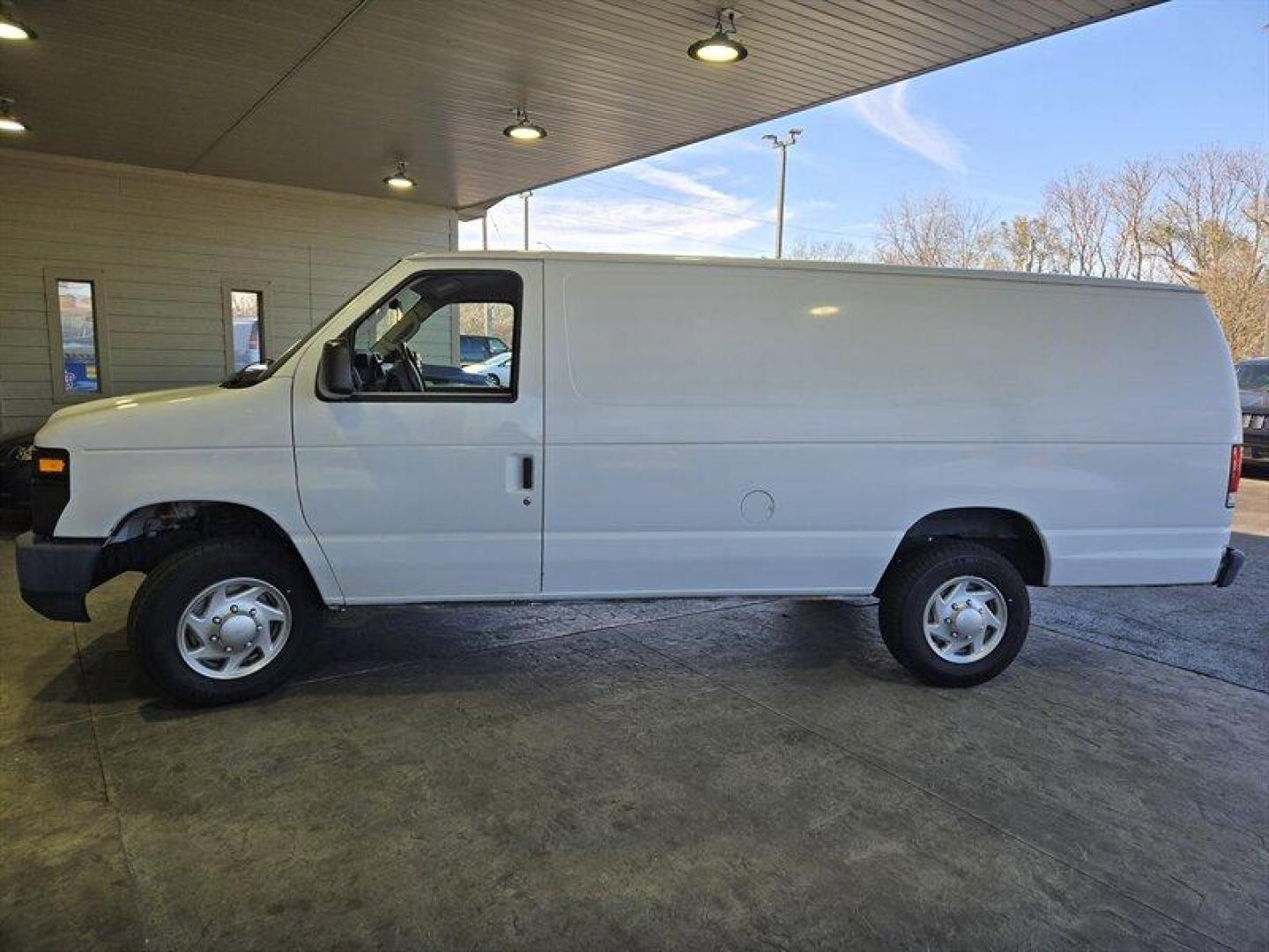 2013 Oxford White Ford Commercial (1FTNS1EW3DD) with an Triton 4.6L Flex Fuel V8 225hp 286ft. lbs. engine, Automatic transmission, located at 25355 Eames Street, Channahon, IL, 60410, (815) 467-1807, 41.429108, -88.228432 - ** HARD TO FIND EXTENDED AND ONLY 5,000 MILES. ** This 2013 Ford E-150 boasts a powerful Triton 4.6L Flex Fuel V8 engine, capable of producing 225 horsepower and 286 ft. lbs. of torque. With its low mileage of less than 6,000 miles and averaging less than 1,000 miles per year, this vehicle is in exc - Photo#8