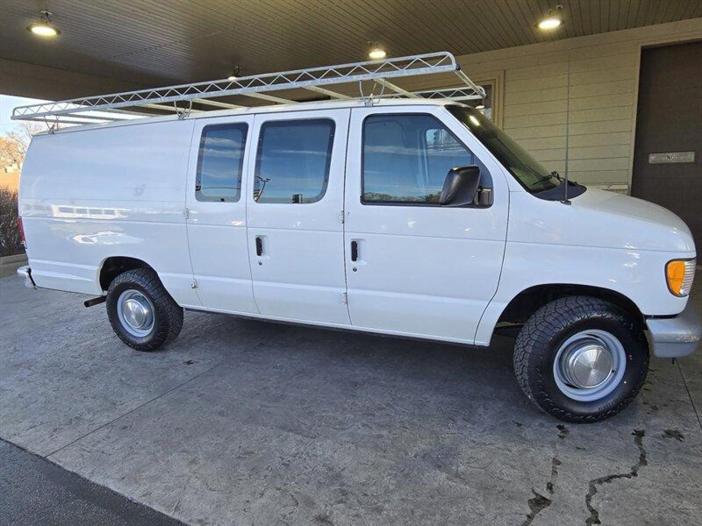 2001 Oxford White Clearcoat Ford Commercial (1FTNS24281H) with an 4.2L V6 191hp 244ft. lbs. engine, Automatic transmission, located at 25355 Eames Street, Channahon, IL, 60410, (815) 467-1807, 41.429108, -88.228432 - This 2001 Ford E-250 is a reliable and well-maintained vehicle with less than 75,000 miles on it. It comes with a 4.2L V6 191hp 244ft. lbs. engine that delivers smooth and consistent performance. The exterior of the vehicle is Oxford White Clearcoat, which gives it a timeless look that never goes ou - Photo#1