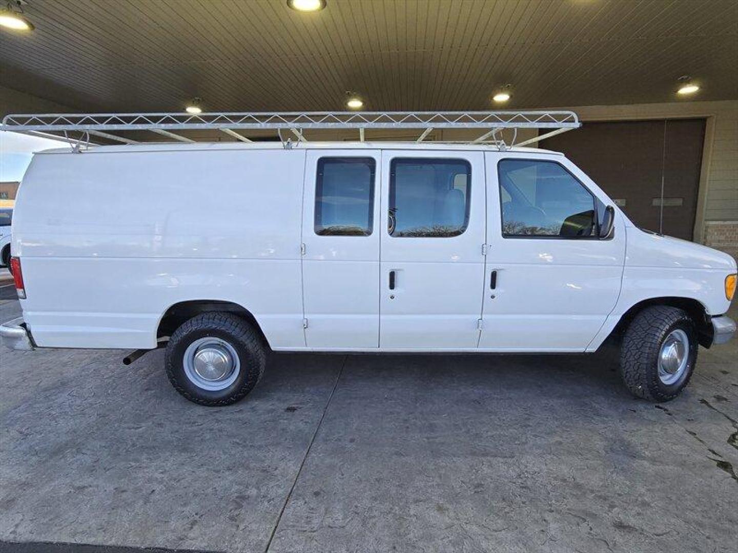 2001 Oxford White Clearcoat Ford Commercial (1FTNS24281H) with an 4.2L V6 191hp 244ft. lbs. engine, Automatic transmission, located at 25355 Eames Street, Channahon, IL, 60410, (815) 467-1807, 41.429108, -88.228432 - This 2001 Ford E-250 is a reliable and well-maintained vehicle with less than 75,000 miles on it. It comes with a 4.2L V6 191hp 244ft. lbs. engine that delivers smooth and consistent performance. The exterior of the vehicle is Oxford White Clearcoat, which gives it a timeless look that never goes ou - Photo#2