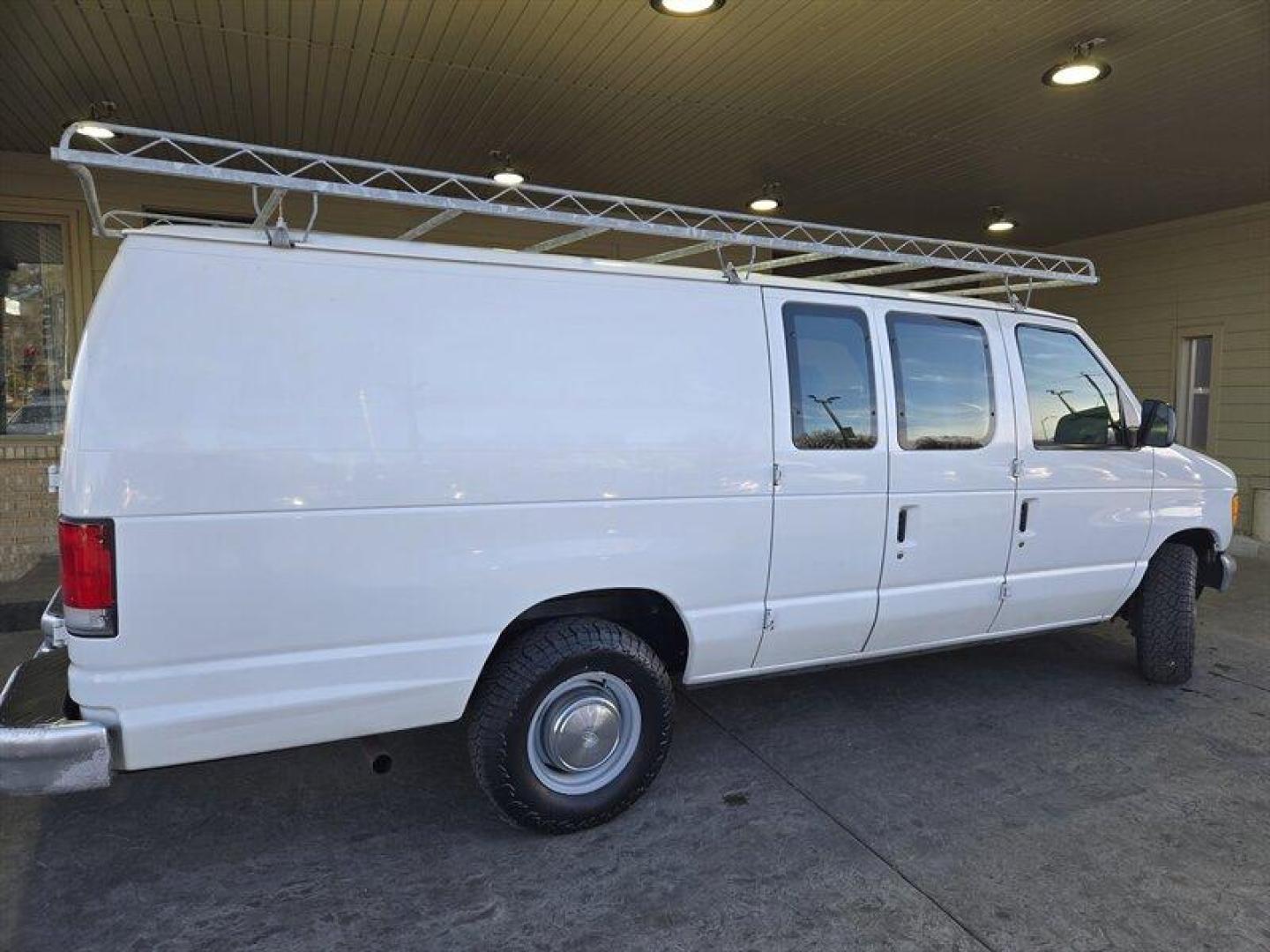 2001 Oxford White Clearcoat Ford Commercial (1FTNS24281H) with an 4.2L V6 191hp 244ft. lbs. engine, Automatic transmission, located at 25355 Eames Street, Channahon, IL, 60410, (815) 467-1807, 41.429108, -88.228432 - This 2001 Ford E-250 is a reliable and well-maintained vehicle with less than 75,000 miles on it. It comes with a 4.2L V6 191hp 244ft. lbs. engine that delivers smooth and consistent performance. The exterior of the vehicle is Oxford White Clearcoat, which gives it a timeless look that never goes ou - Photo#3