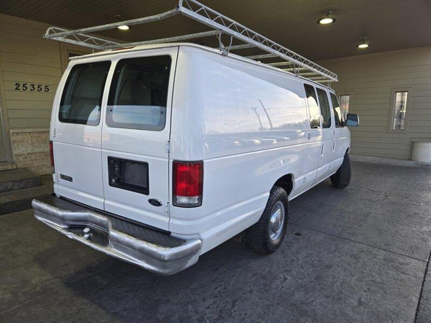 2001 Oxford White Clearcoat Ford Commercial (1FTNS24281H) with an 4.2L V6 191hp 244ft. lbs. engine, Automatic transmission, located at 25355 Eames Street, Channahon, IL, 60410, (815) 467-1807, 41.429108, -88.228432 - This 2001 Ford E-250 is a reliable and well-maintained vehicle with less than 75,000 miles on it. It comes with a 4.2L V6 191hp 244ft. lbs. engine that delivers smooth and consistent performance. The exterior of the vehicle is Oxford White Clearcoat, which gives it a timeless look that never goes ou - Photo#4