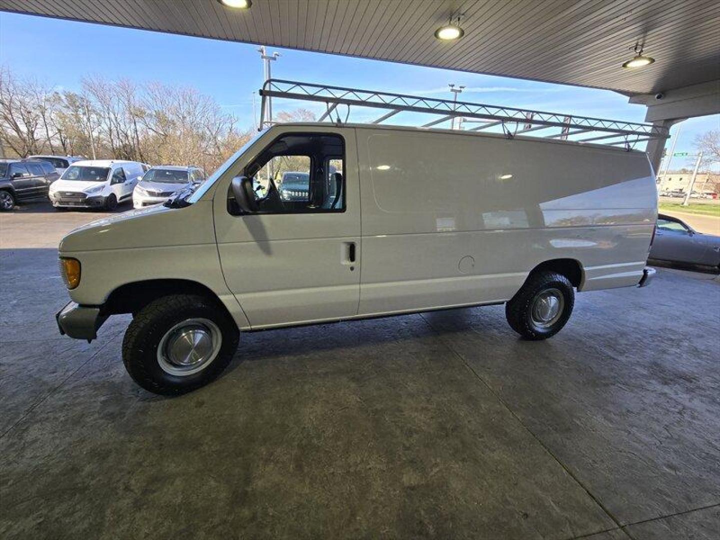 2001 Oxford White Clearcoat Ford Commercial (1FTNS24281H) with an 4.2L V6 191hp 244ft. lbs. engine, Automatic transmission, located at 25355 Eames Street, Channahon, IL, 60410, (815) 467-1807, 41.429108, -88.228432 - This 2001 Ford E-250 is a reliable and well-maintained vehicle with less than 75,000 miles on it. It comes with a 4.2L V6 191hp 244ft. lbs. engine that delivers smooth and consistent performance. The exterior of the vehicle is Oxford White Clearcoat, which gives it a timeless look that never goes ou - Photo#8