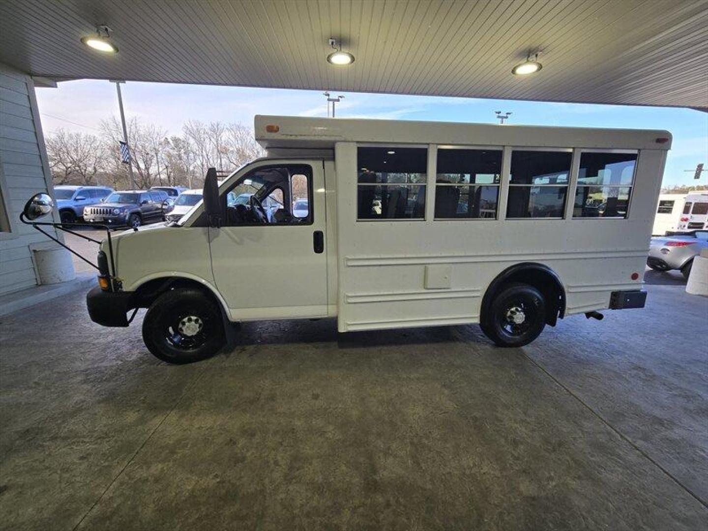 2007 White Chevrolet Express Work Van Cutaway (1GBHG31V171) , Automatic transmission, located at 25355 Eames Street, Channahon, IL, 60410, (815) 467-1807, 41.429108, -88.228432 - ** COLLINS 15 PASSENGER BUS. ** This 2007 Chevrolet Express is a great choice for anyone in need of a reliable and spacious vehicle. With a sleek white exterior and a clean gray interior, this van is both stylish and practical. The low mileage of less than 44,000 miles makes this vehicle an excellen - Photo#8