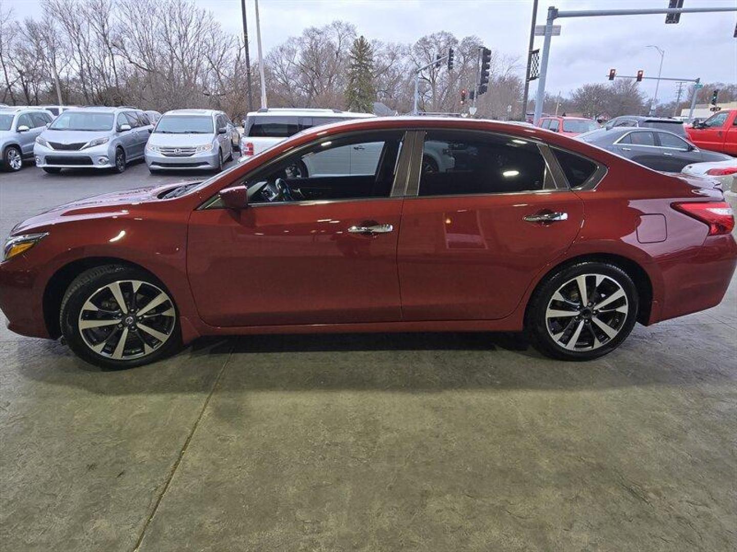 2016 Cayenne Red Nissan Altima 2.5 SR (1N4AL3AP6GC) with an 2.5 engine, Automatic transmission, located at 25355 Eames Street, Channahon, IL, 60410, (815) 467-1807, 41.429108, -88.228432 - Introducing the sleek and stylish 2016 Nissan Altima 2.5 SR, a vehicle that's sure to turn heads on the road. With a powerful 2.5-liter engine, you can expect a smooth and exhilarating ride with plenty of pep under the hood. But that's not all this beauty has to offer. Let's take a closer look at - Photo#6