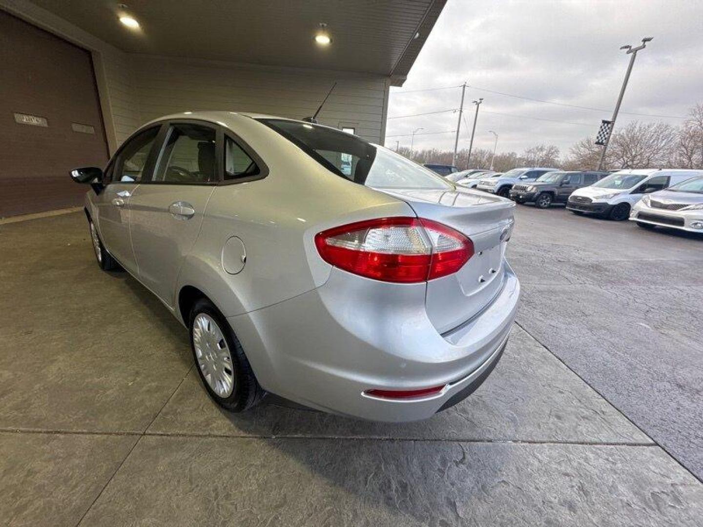 2016 Ingot Silver Ford Fiesta S (3FADP4AJ4GM) with an 1.6L I4 120hp 112ft. lbs. engine, Automatic transmission, located at 25355 Eames Street, Channahon, IL, 60410, (815) 467-1807, 41.429108, -88.228432 - Introducing the 2016 Ford Fiesta S, a compact car that packs a punch! With a 1.6L I4 120hp 112ft. lbs. engine, this car is sure to give you a smooth and comfortable ride wherever you go. And with less than 15,000 miles on the odometer, this vehicle has been lovingly cared for and driven less than 2, - Photo#4